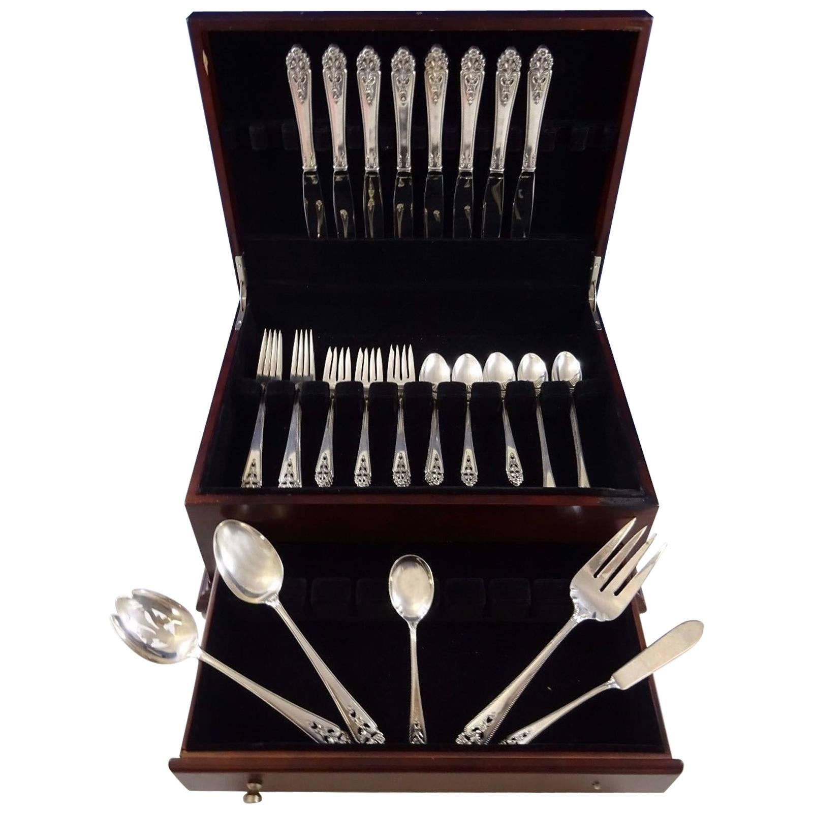 Precioso juego de cubiertos Queens Lace de International Sterling Silver, 45 piezas. Este juego incluye: 

Ocho cuchillos tamaño cena, 9 5/8