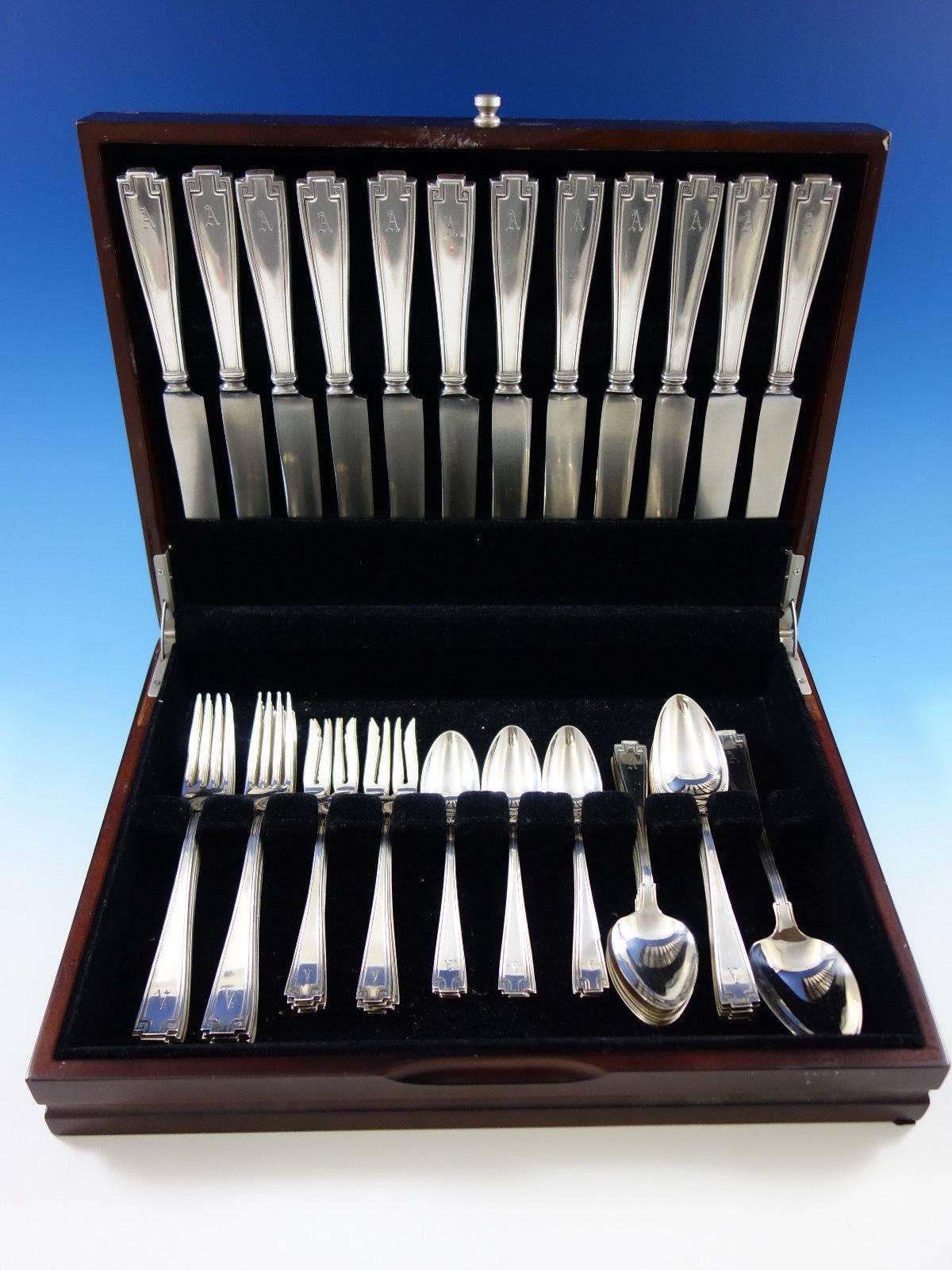 Dinner size Etruscan by Gorham sterling silver flatware set, 49 pieces. This set includes: 

12 dinner size knives, 9 1/2