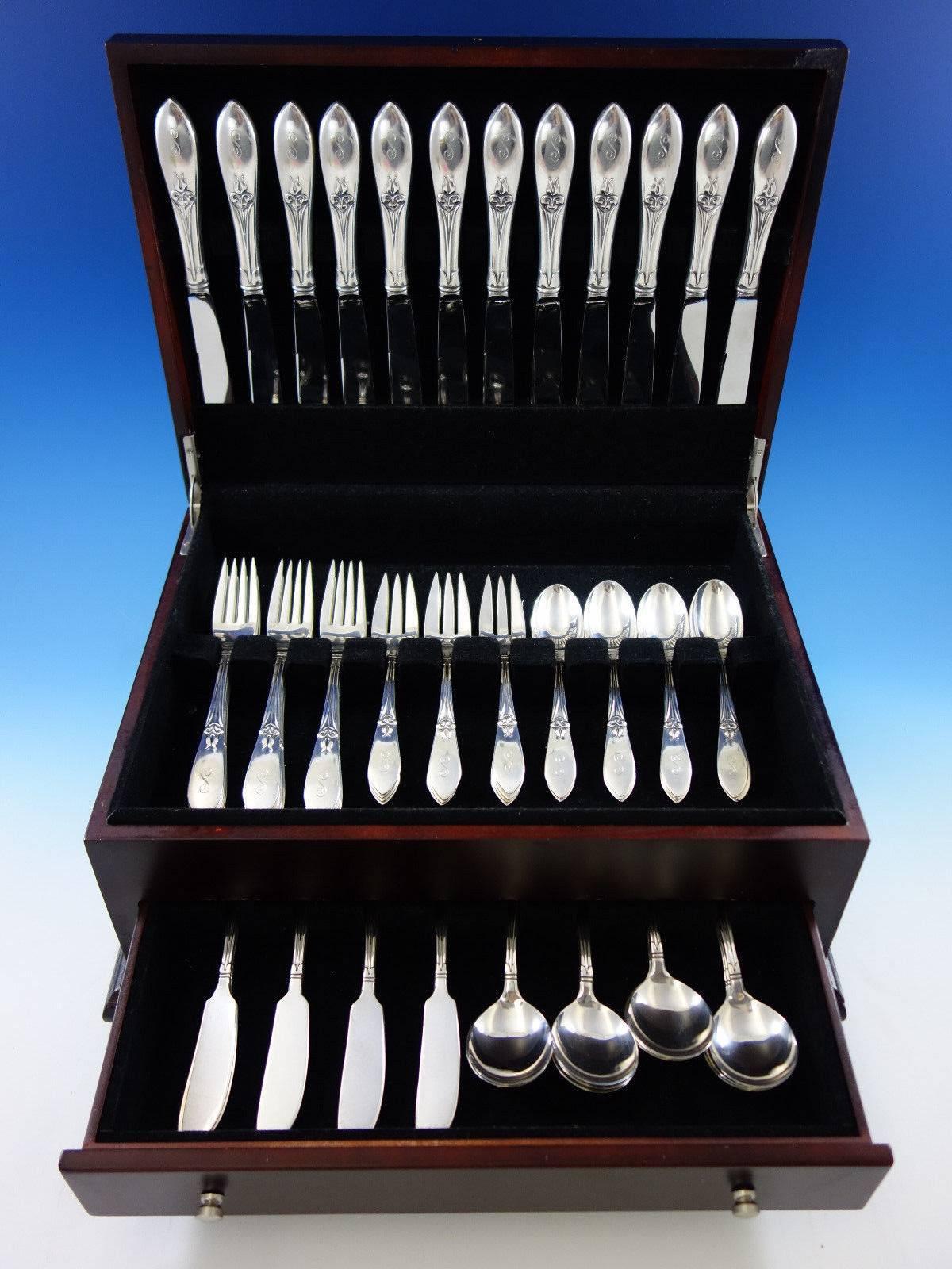 Outstanding Tulipan by Frank Smith sterling silver flatware set, 72 pieces. This set includes:

12 knives, 9 1/4