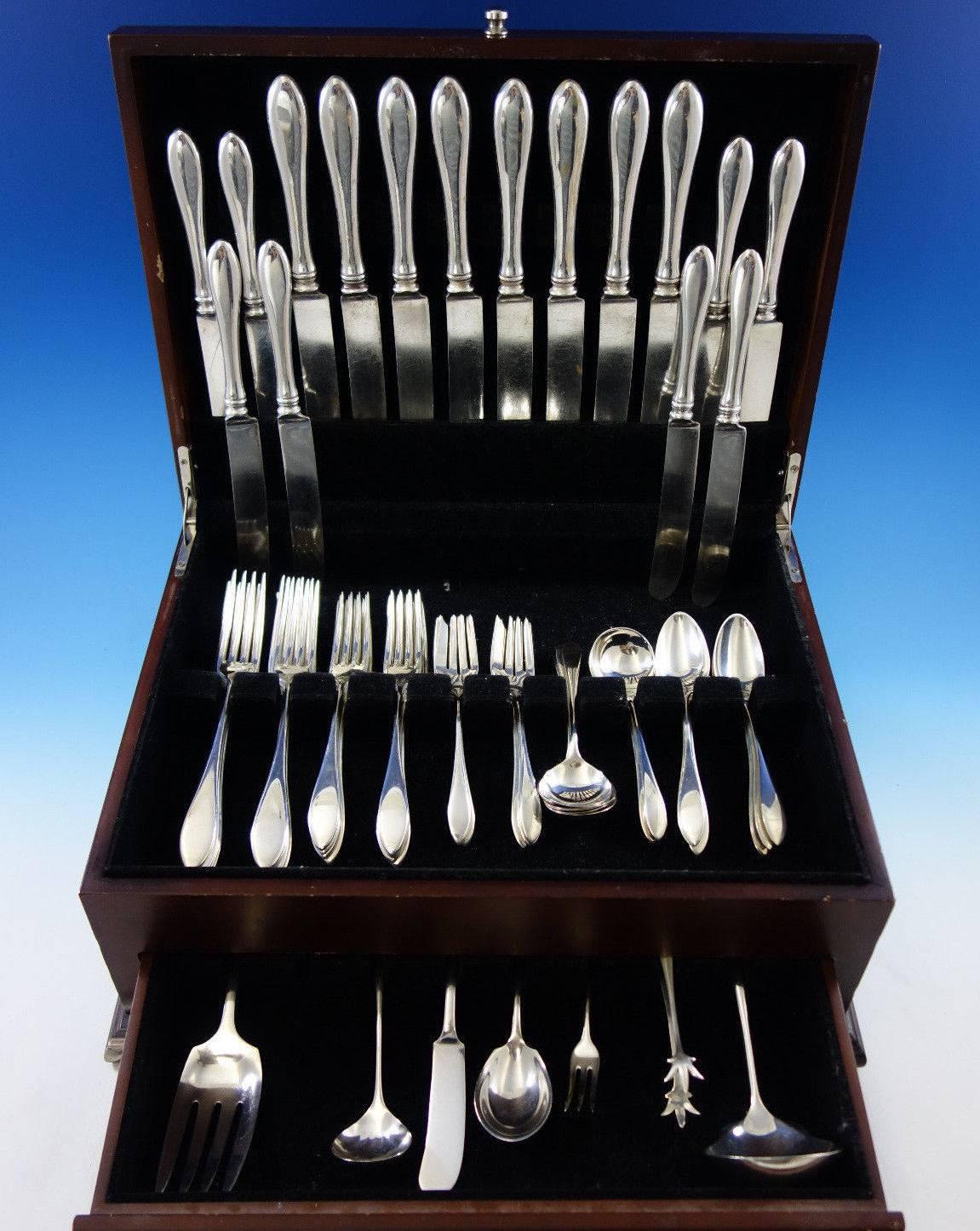 Large dinner and lunch size completely unadorned and simply elegant puritan by Wallace sterling silver flatware set, 63 pieces. This set includes: eight dinner knives,9 5/8