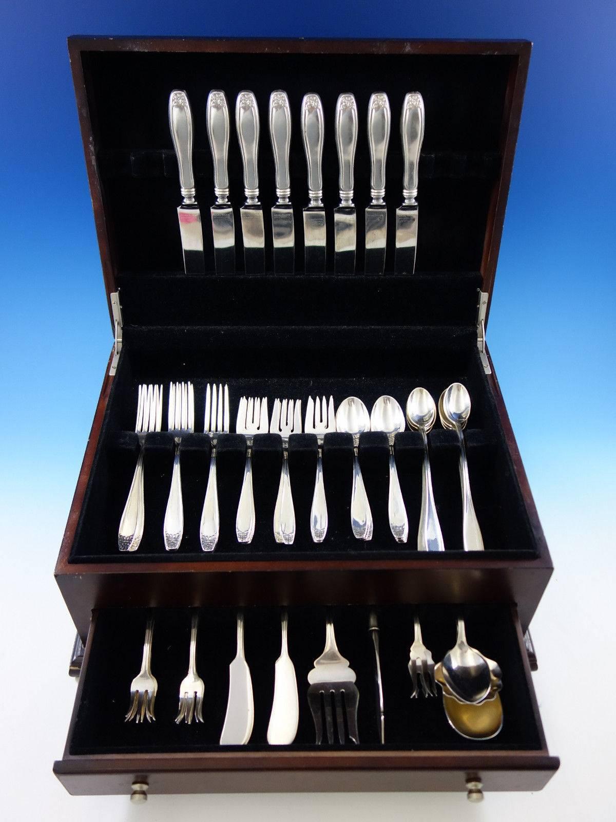 Puritan by Stieff sterling silver flatware set, 63 pieces. This set includes: 

Eight knives, 9