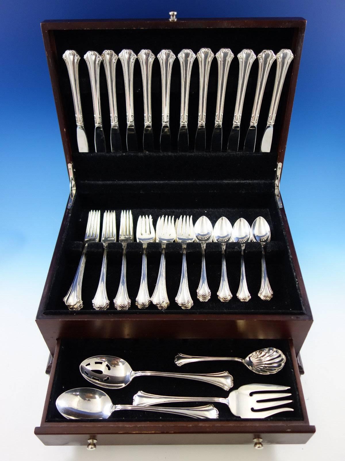 English Chippendale by Reed & Barton sterling silver flatware set of 52 pieces. This set includes: 12 knives, 8 7/8