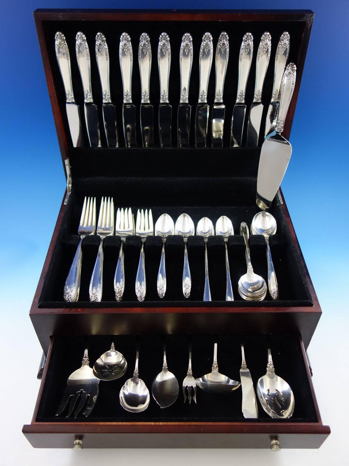 Dinner size prelude by International Sterling silver flatware set, 82 pieces. This set includes: 

12 dinner size knives, 9 5/8