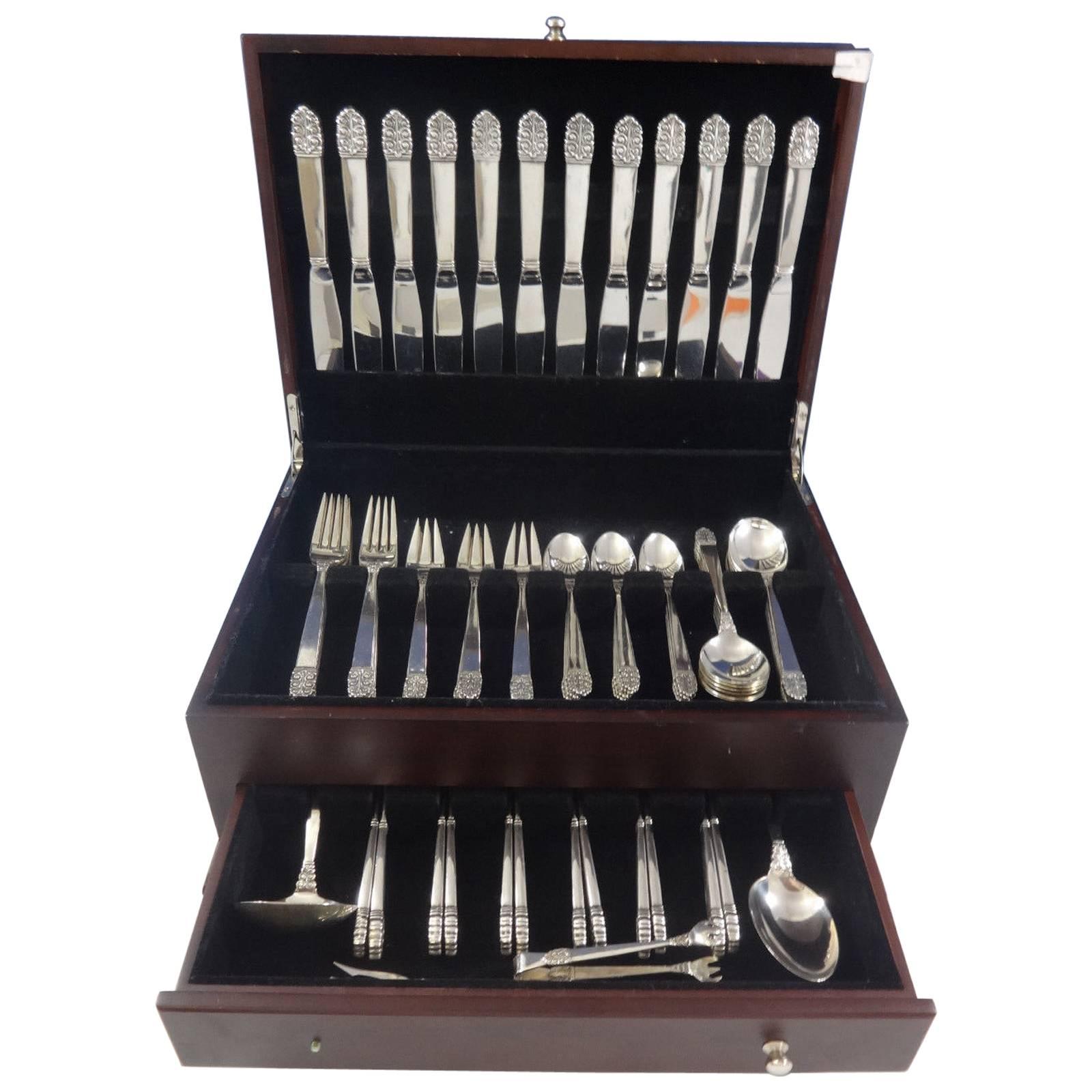 Gorgeous Mid-Century Modern Northern Lights by International sterling silver flatware set of 77 pieces. This set includes: 12 knives, 8 7/8