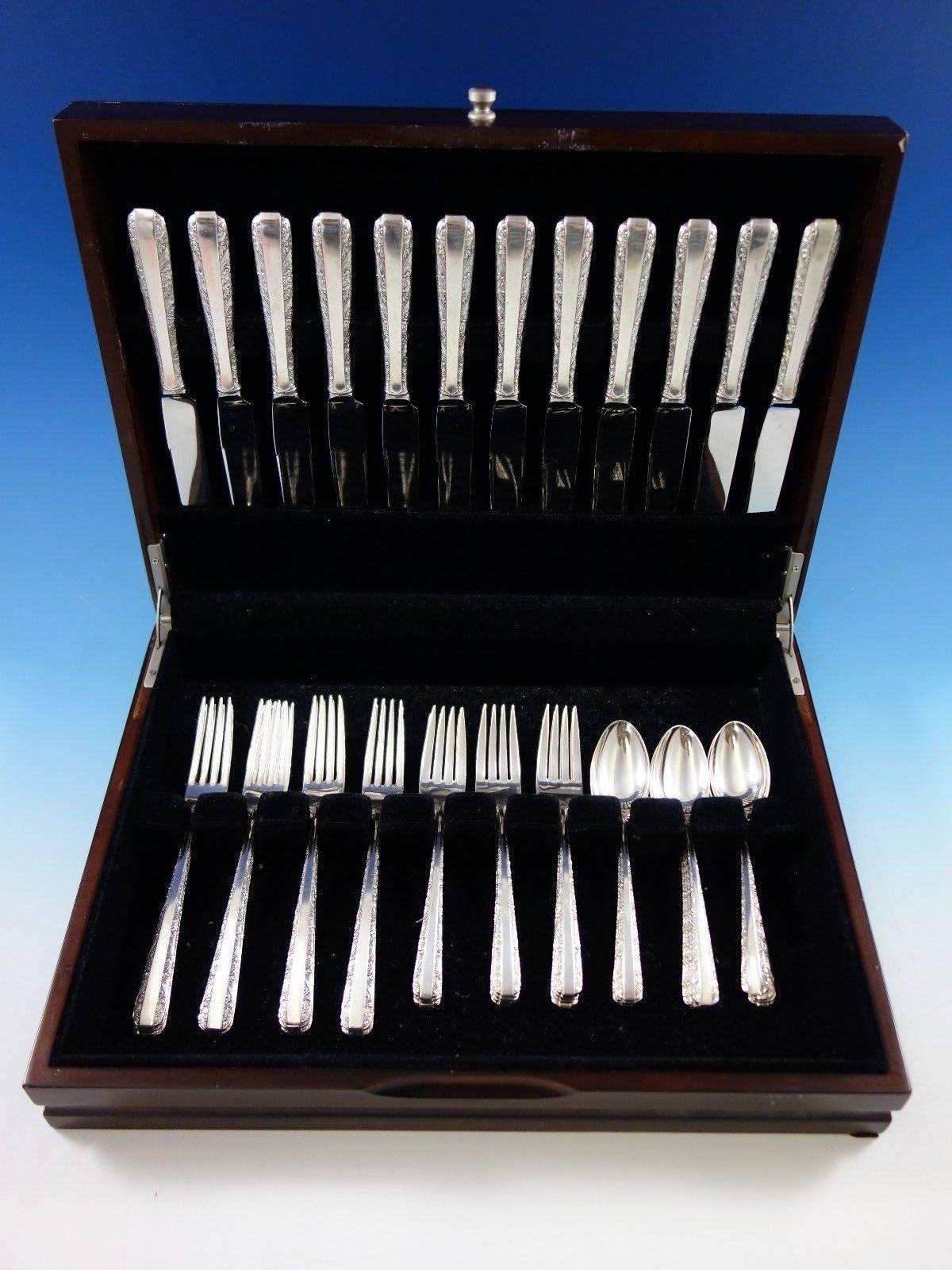 Candlelight by towle sterling silver flatware set - 48 pieces. This set includes: 

12 knives, 8 3/4