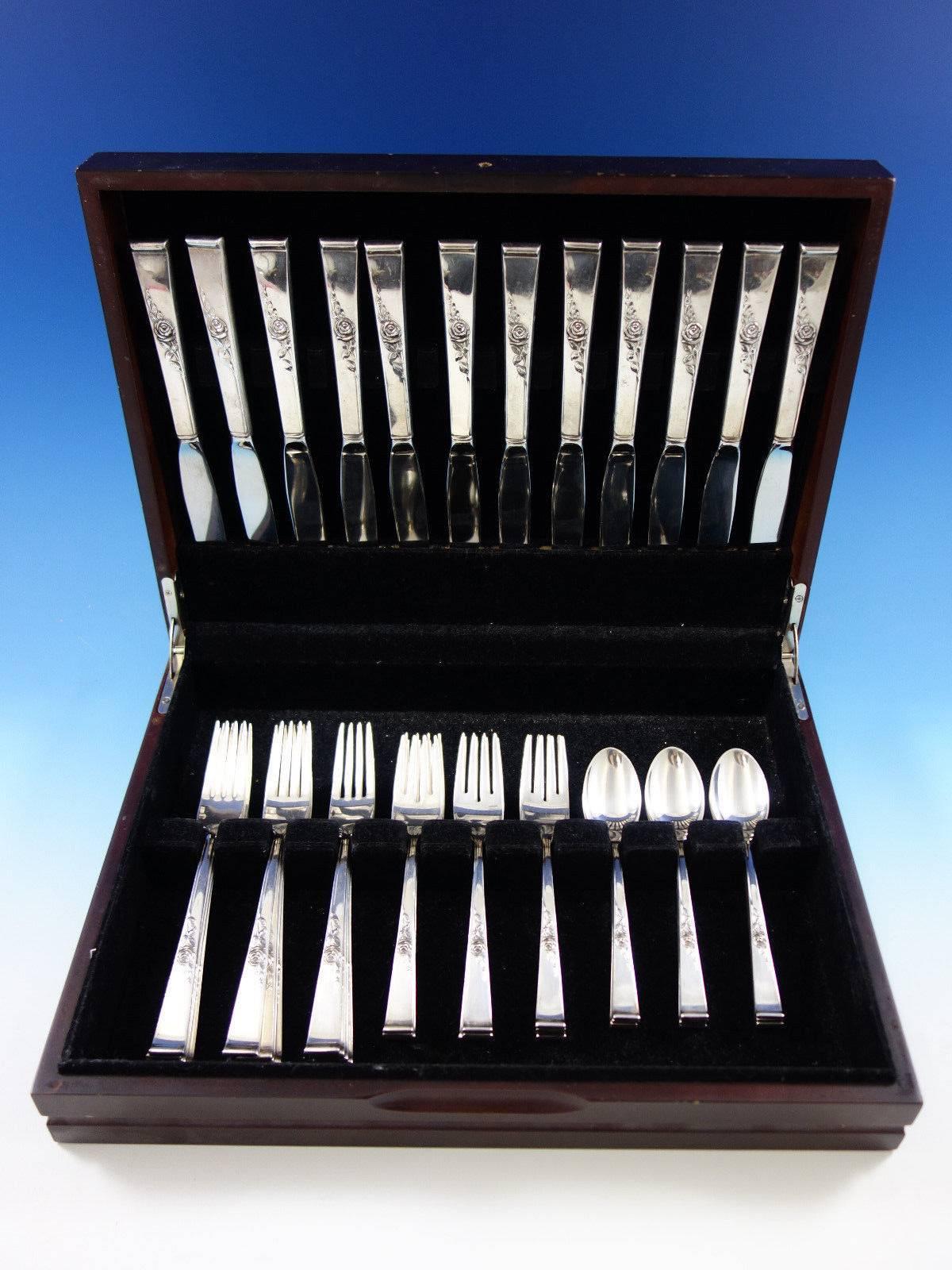 Stunning Classic rose by Reed and Barton sterling silver flatware set - 48 pieces. This set includes: 

12 knives, 9 1/8