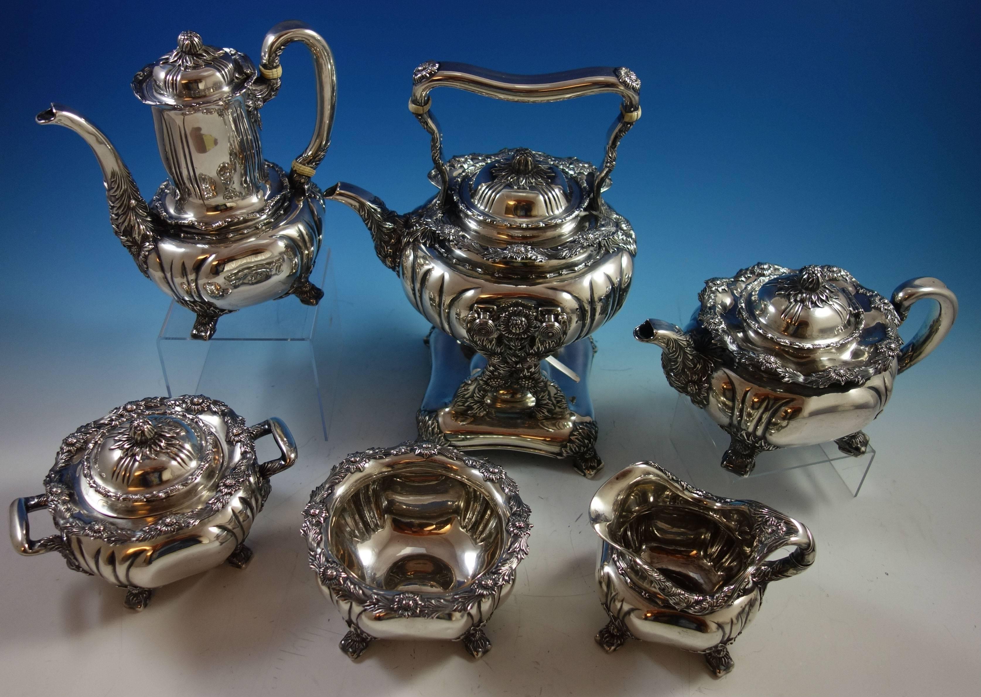 Superb Chrysanthemum by Tiffany & Co. sterling silver six-piece tea set. This set includes:

One kettle on stand: Weighs 90 troy ounces, and measures 14