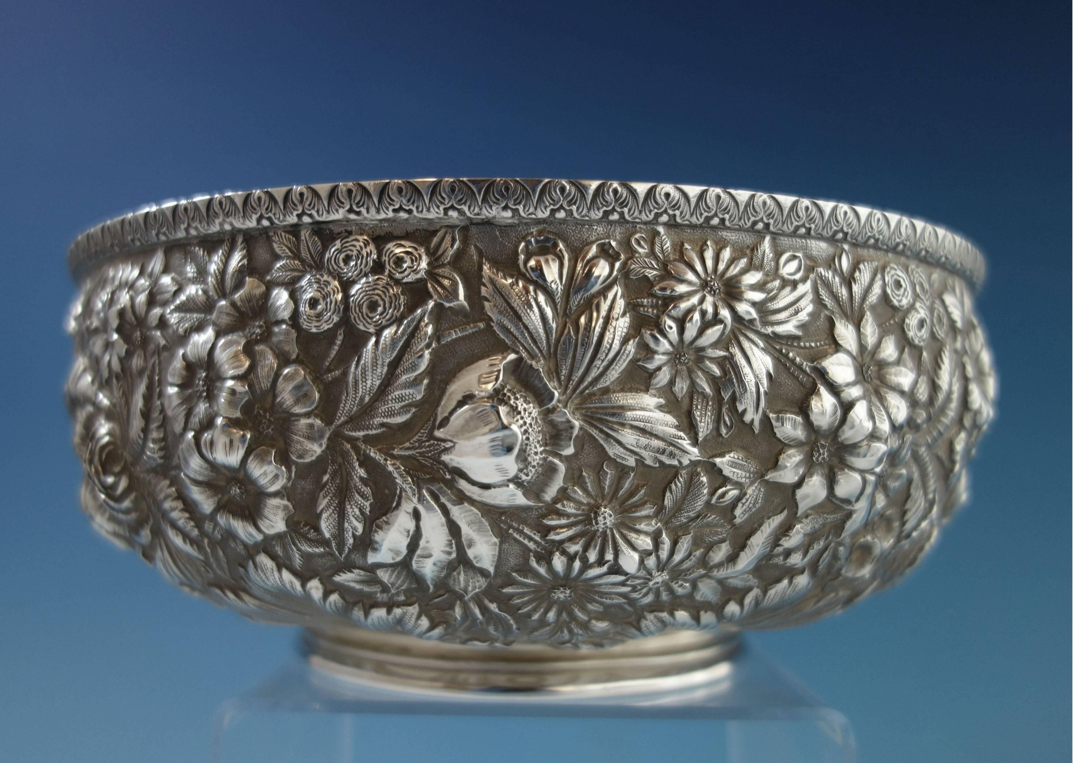 Repousse by Jenkins & Jenkins sterling silver footed fruit bowl. It is marked #188 and retailed by J.E. Caldwell. This piece weighs 19.7 troy ounces and measures 4 1/4" x 8 1/4" diameter. It is monogrammed on the underside (see photo),
