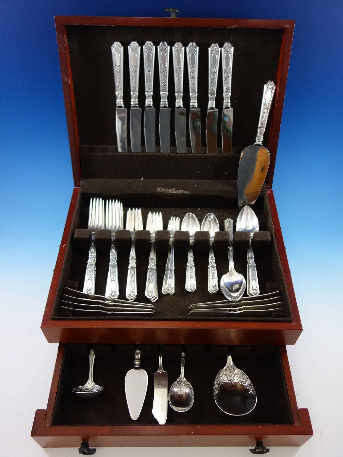 Dinner size Saint Dunstan Chased by Gorham sterling silver flatware set - 62 pieces. This set includes: 

Eight dinner size knives, 9 3/4