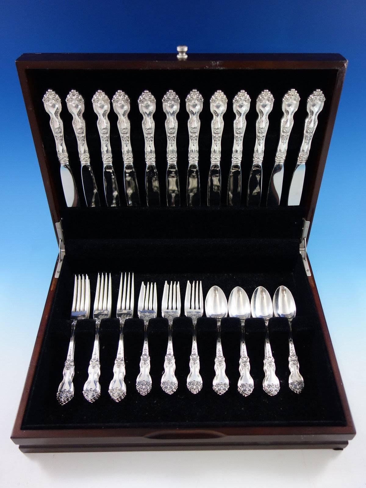 La Reine by Wallace sterling silver flatware set of 48 pieces. This set includes: 

12 knives, 9