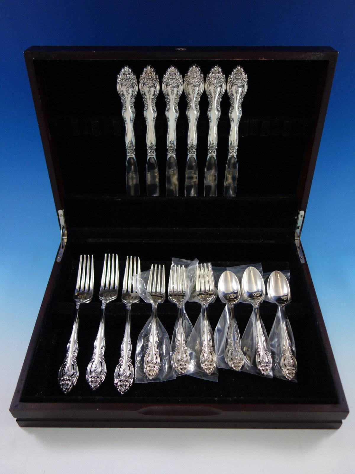 La Scala by Gorham sterling silver flatware set, 24 pieces. Great starter set! This set includes: 

Six dinner size knives, 9 3/4