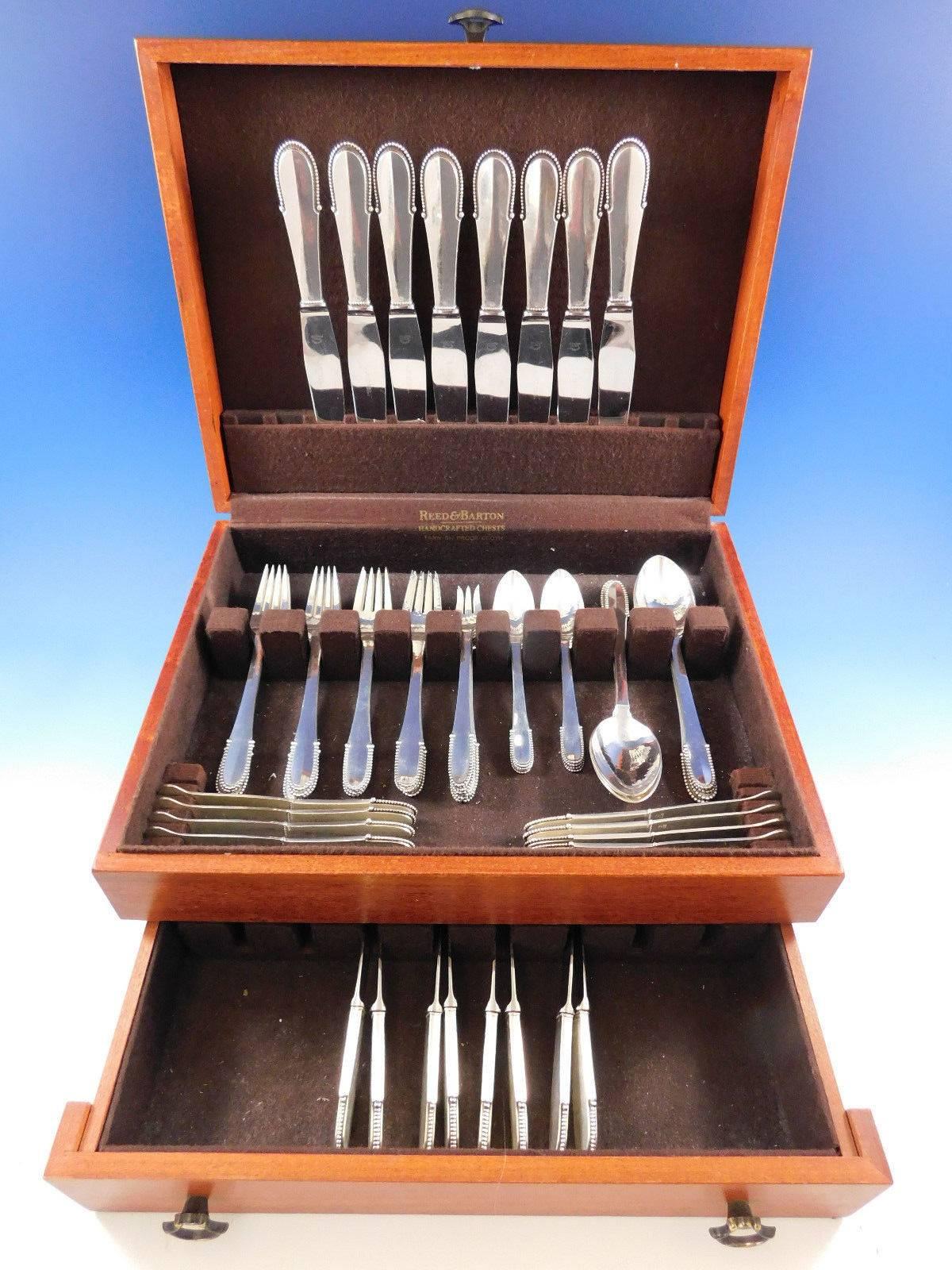 Beaded by Georg Jensen sterling silver flatware set, 64 pieces. This set includes: 

eight dinner knives, 8 7/8