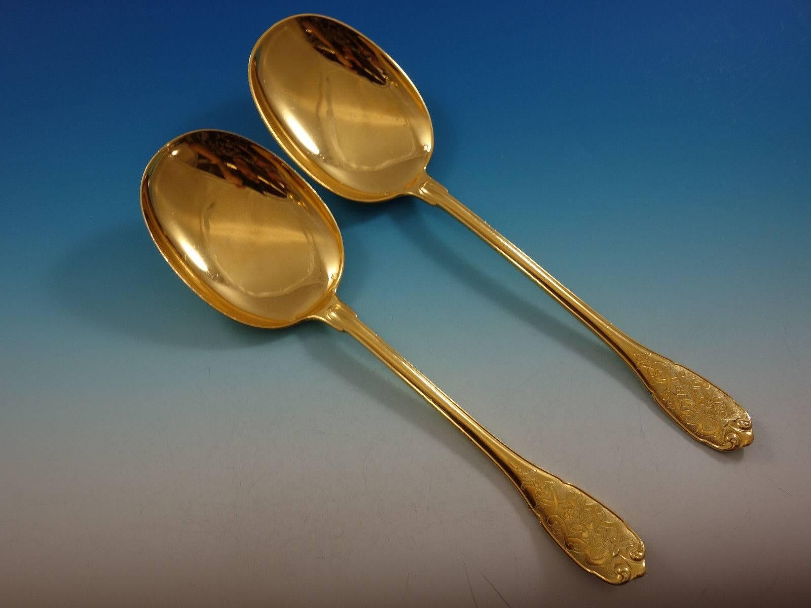 Exceptional Elysee by Puiforcat French sterling silver vermeil (completely gold washed) serving set, seven pieces. This set includes: one salad serving set, two-piece, 9 3/4