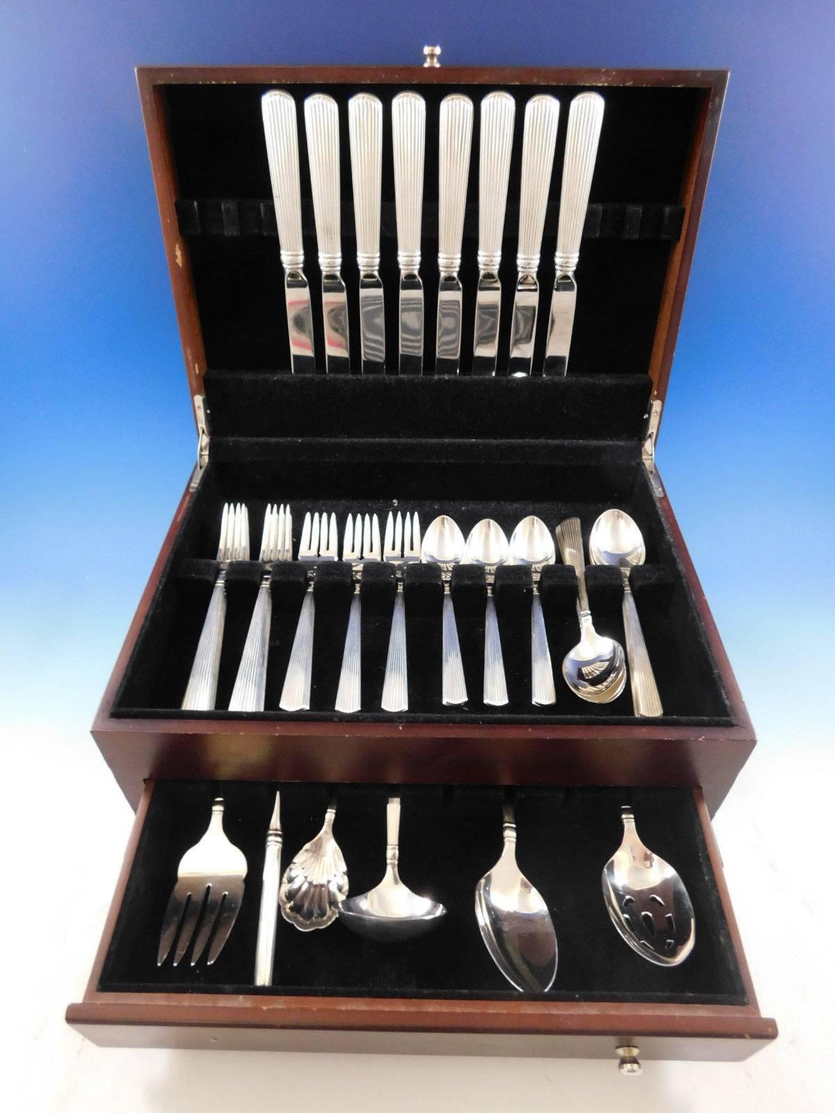 Dinner size timeless Ashmont pattern by Reed & Barton sterling silver flatware set, 46 pieces. This set includes: 

Eight dinner size knives, 9 7/8