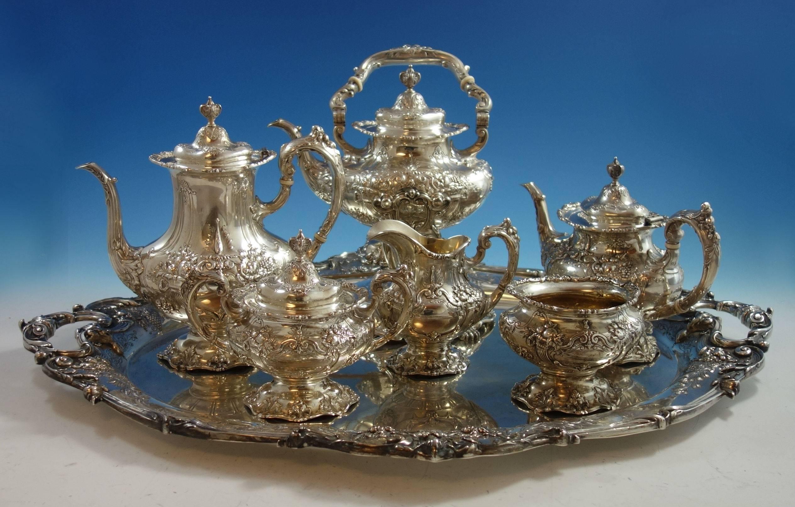 Superb Francis I by Reed & Barton six-piece sterling silver tea set plus the sterling tray. No monograms. The set includes:

One coffee pot: marked with #571a, it weighs 45.5 ozt., and it measures 10 3/8