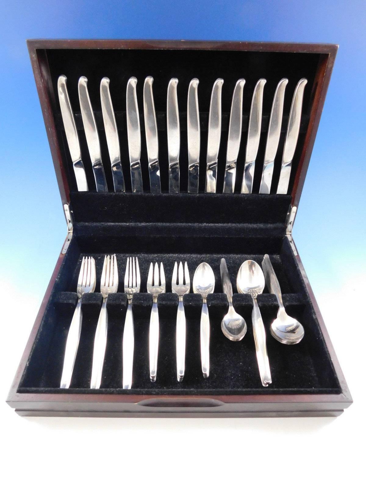 Mid-Century Modern Contour by Towle Sterling Silver Flatware set - 60 pieces. This set includes: 

12 Knives, 8 3/4