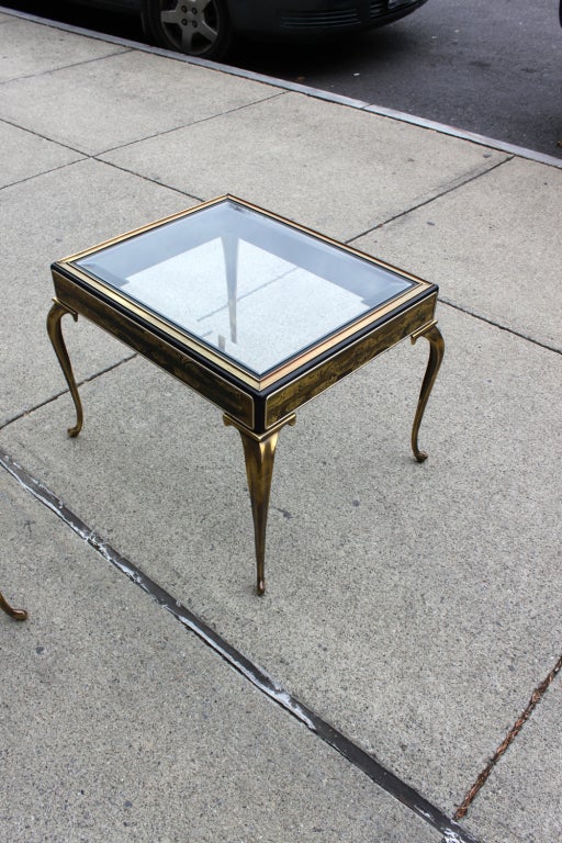Bernhard Rohne for Mastercraft pair of acid-etched brass with black lacquer and glass topped end tables raised on brass cabriole legs.