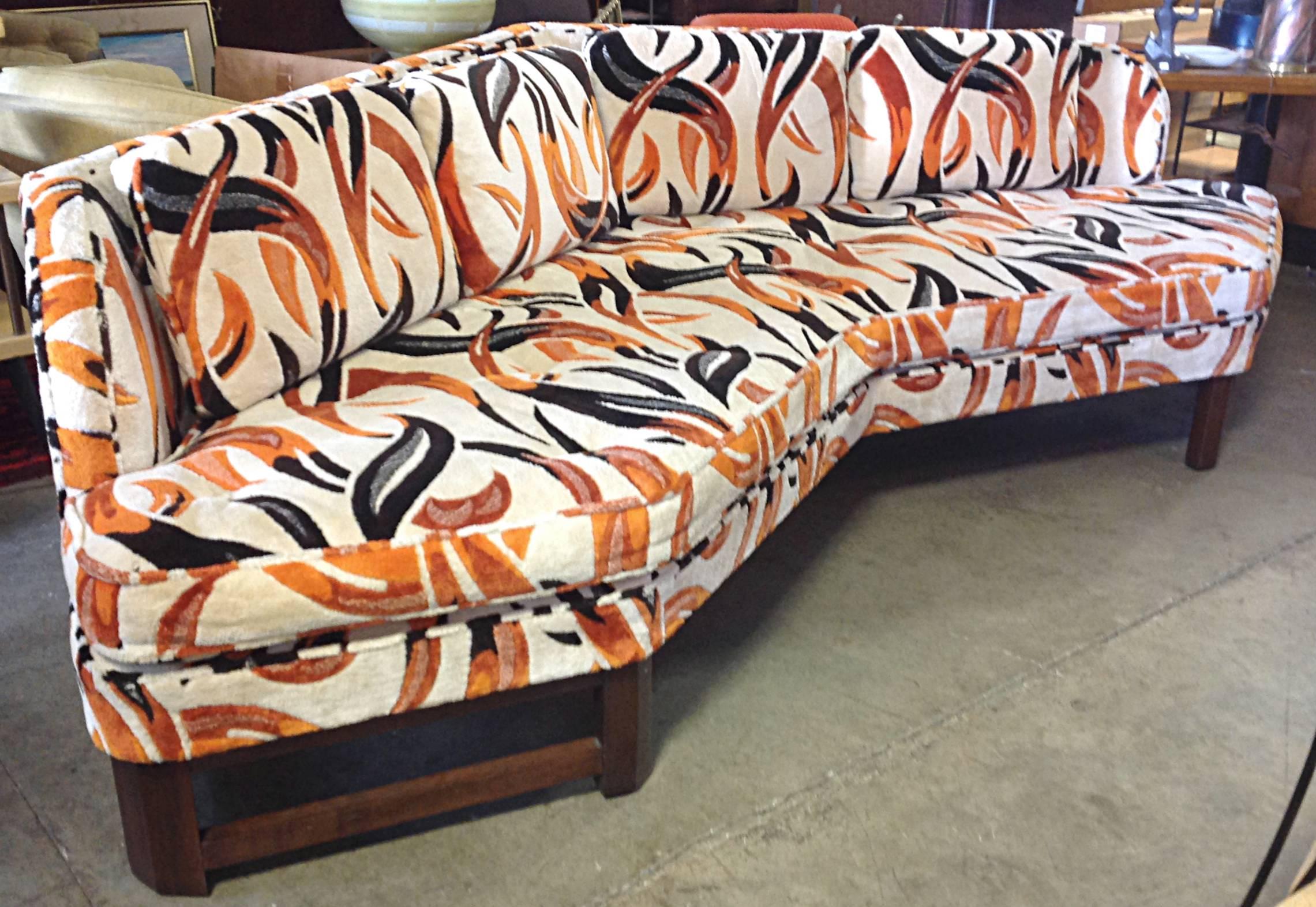 Two angled sofas reminiscent of Wormley's Janus collection pieces. Original plush fabric in graphic 