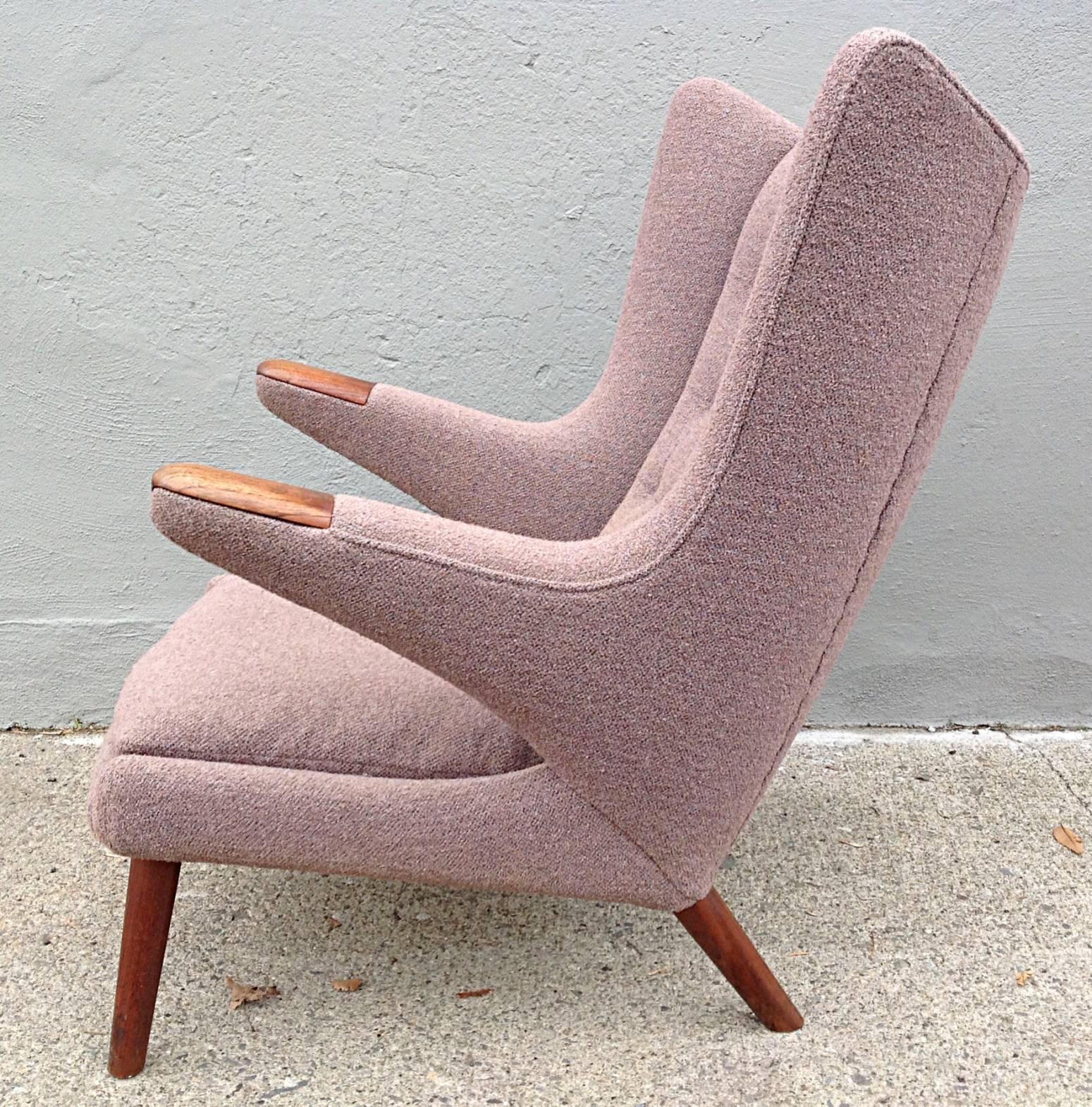 Hans Wegner for AP Stolen Papa Bear chair AP19. Dusty lavender bouclé not original but in very good condition. Exposed wood elements in very good condition rich patina and wear.