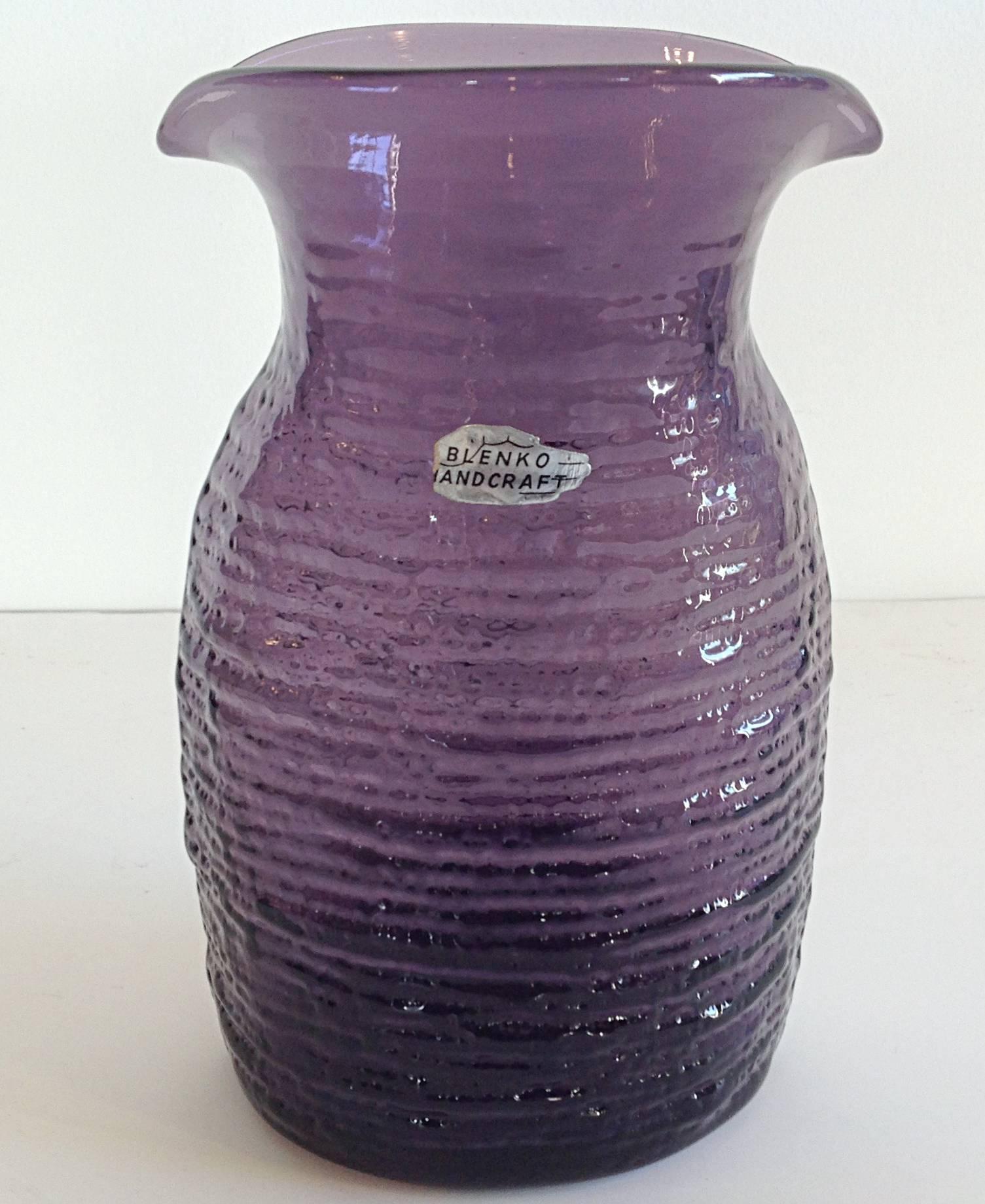 Beautiful forms by Blenko Glass. 
Amethyst horizontal ribbed vase by Wayne Husted 5.25