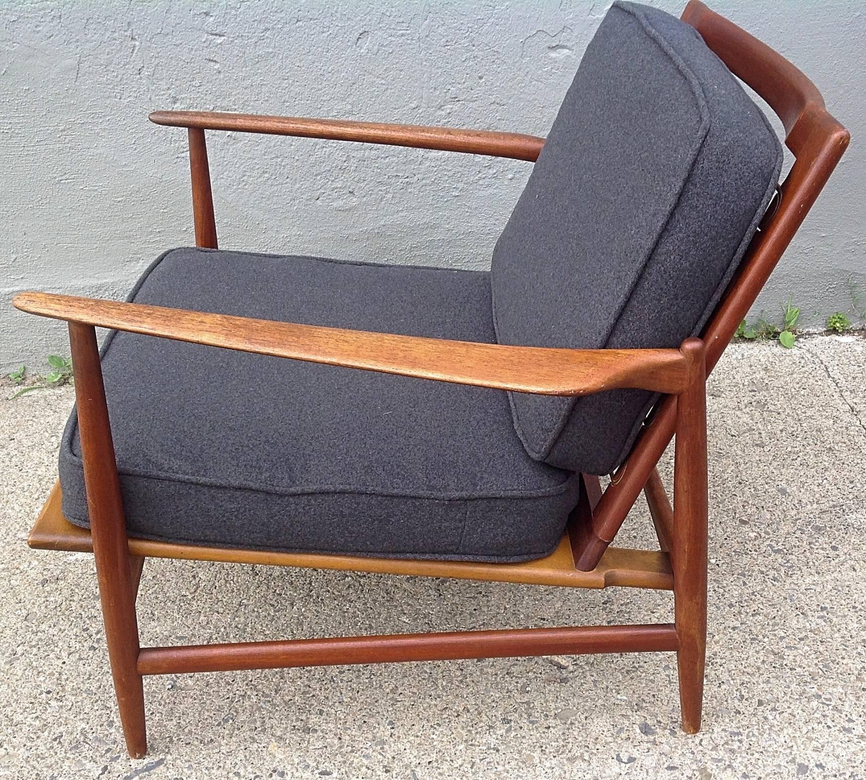 Teak lounge chair designed by Ib Kofod-Larsen for Selig. New charcoal felt fabric.