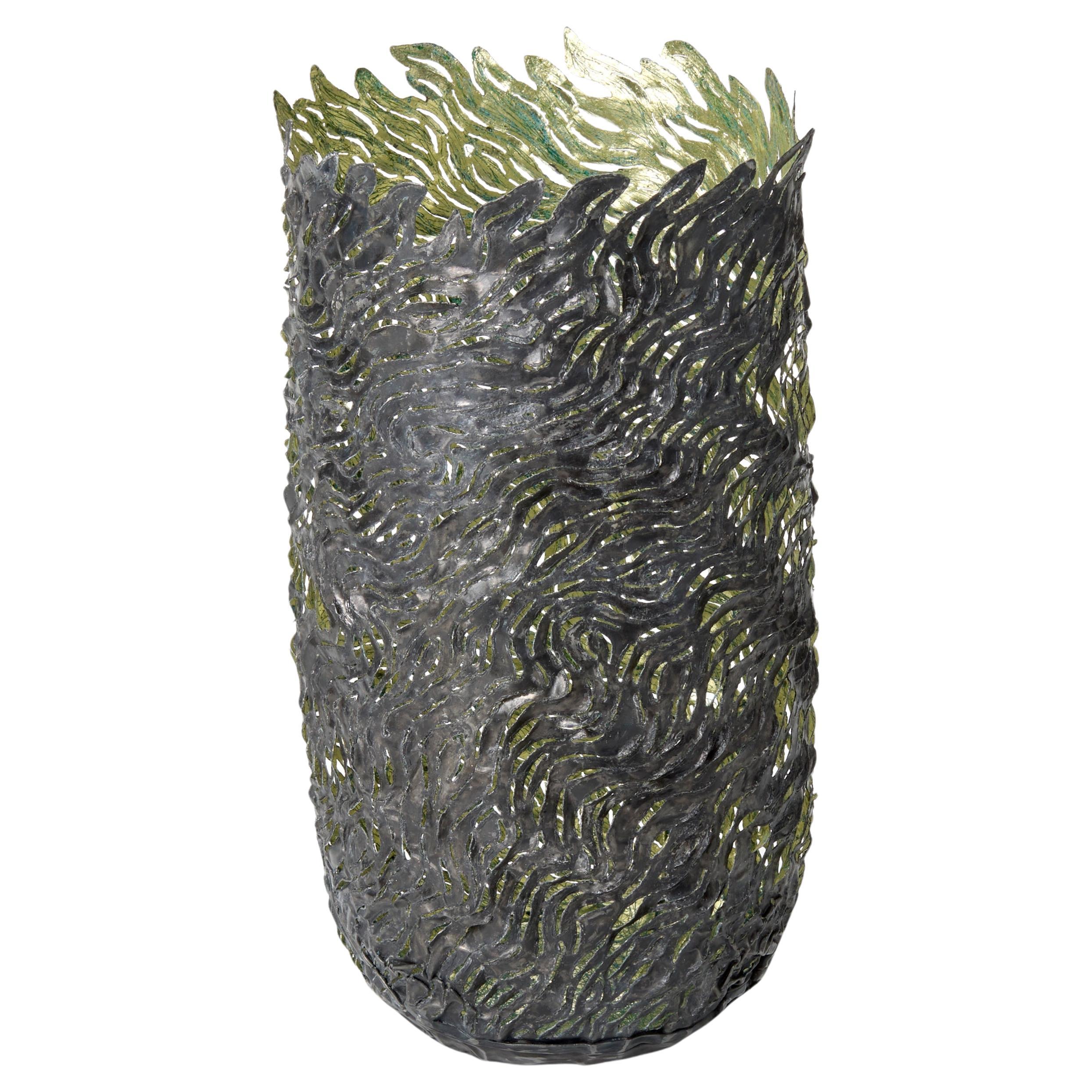 Flowing Vessels, organic textured steel
gold vessels by Claire Malet