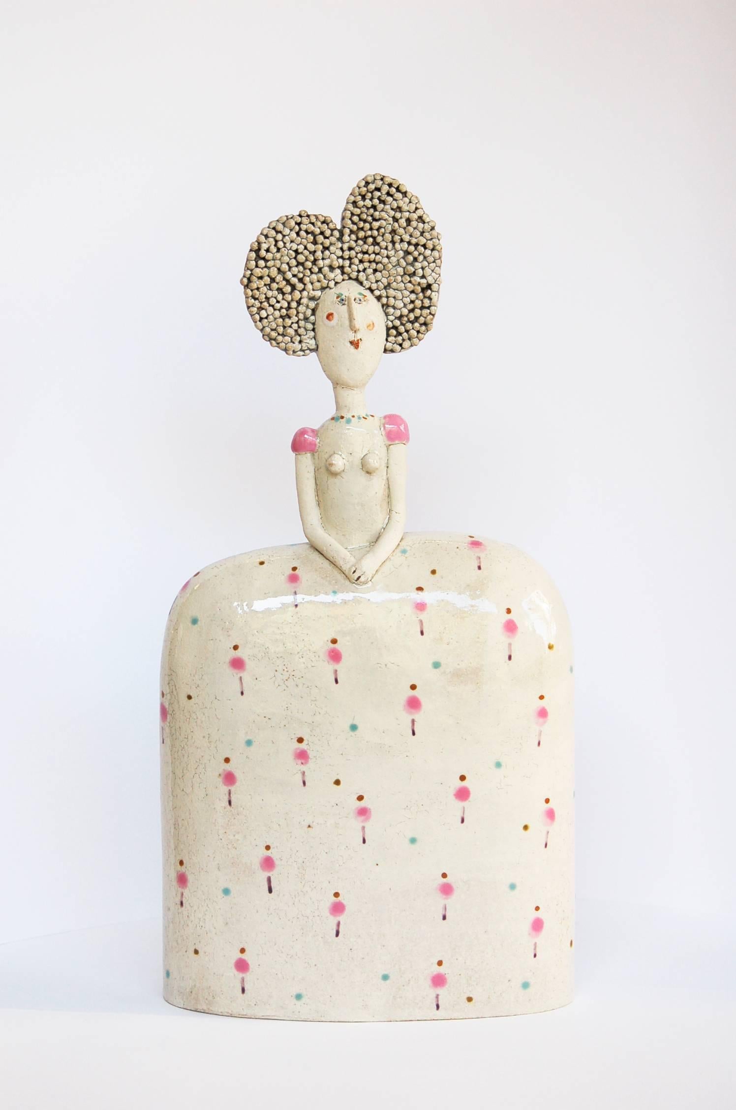 Jane Muir specialises in idiosyncratic hand painted figures representing a witty and uncluttered observation of the world. They are hand modelled, allowing her the freedom to sketch with clay and develop ideas during the making process. Jane's