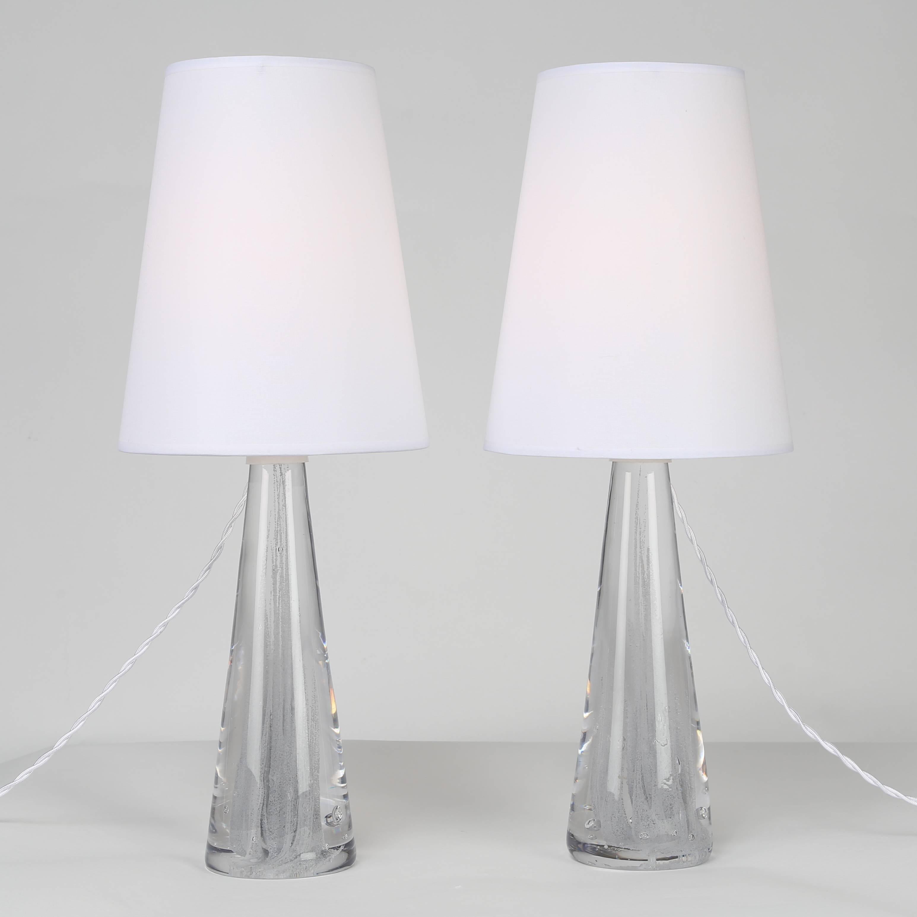 Gorgeous pair of very heavy conical glass lamps with streams of internal bubbles, circa 1960s. Etched signature “Kosta B L 63