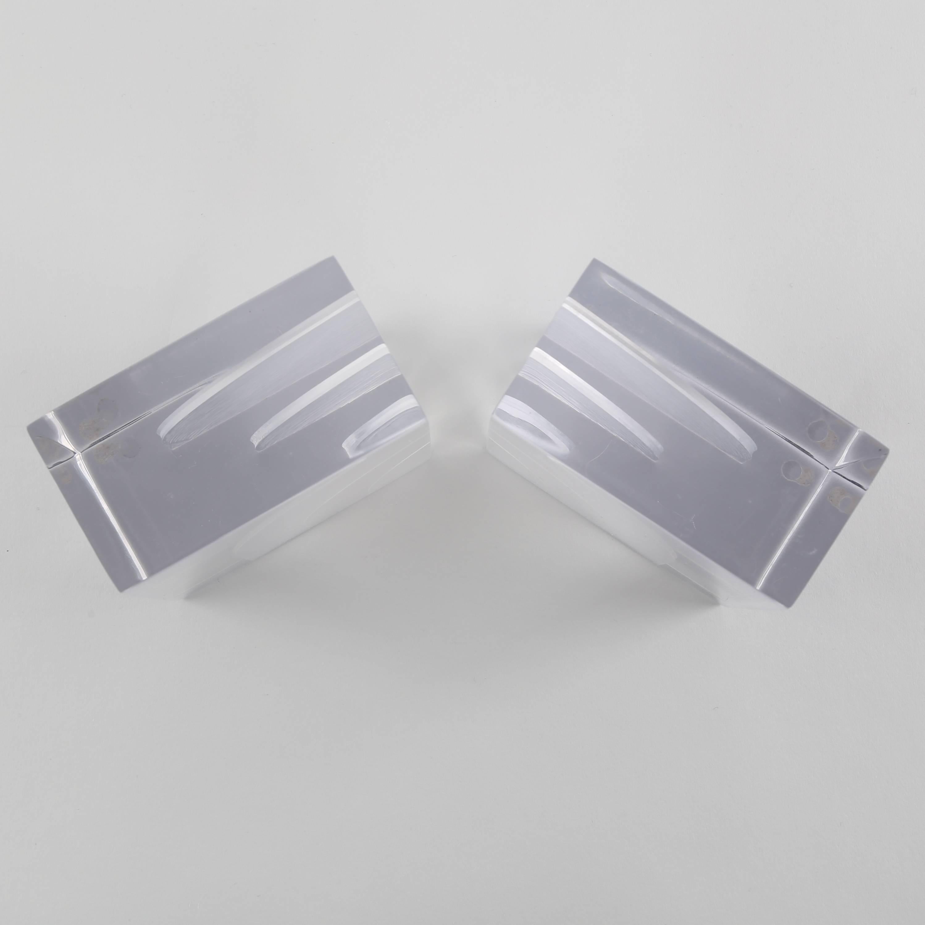 Polished Pair of Thick Lucite Bookends with Internal Sawed Designs
