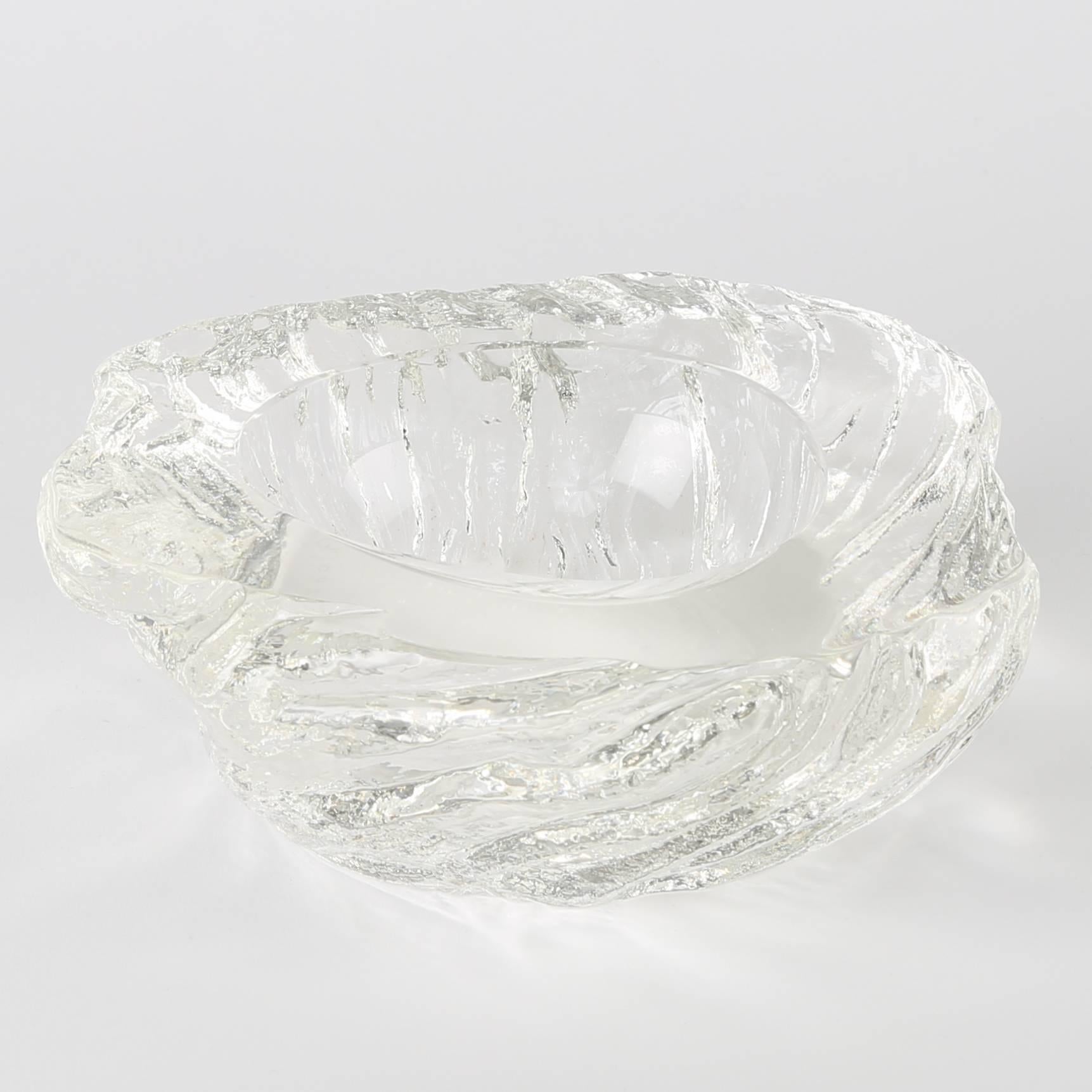 Two handcrafted crystal bowls featuring carved and highly textured exteriors contrasting with smooth interiors and wide flat rims. Large bowl 4