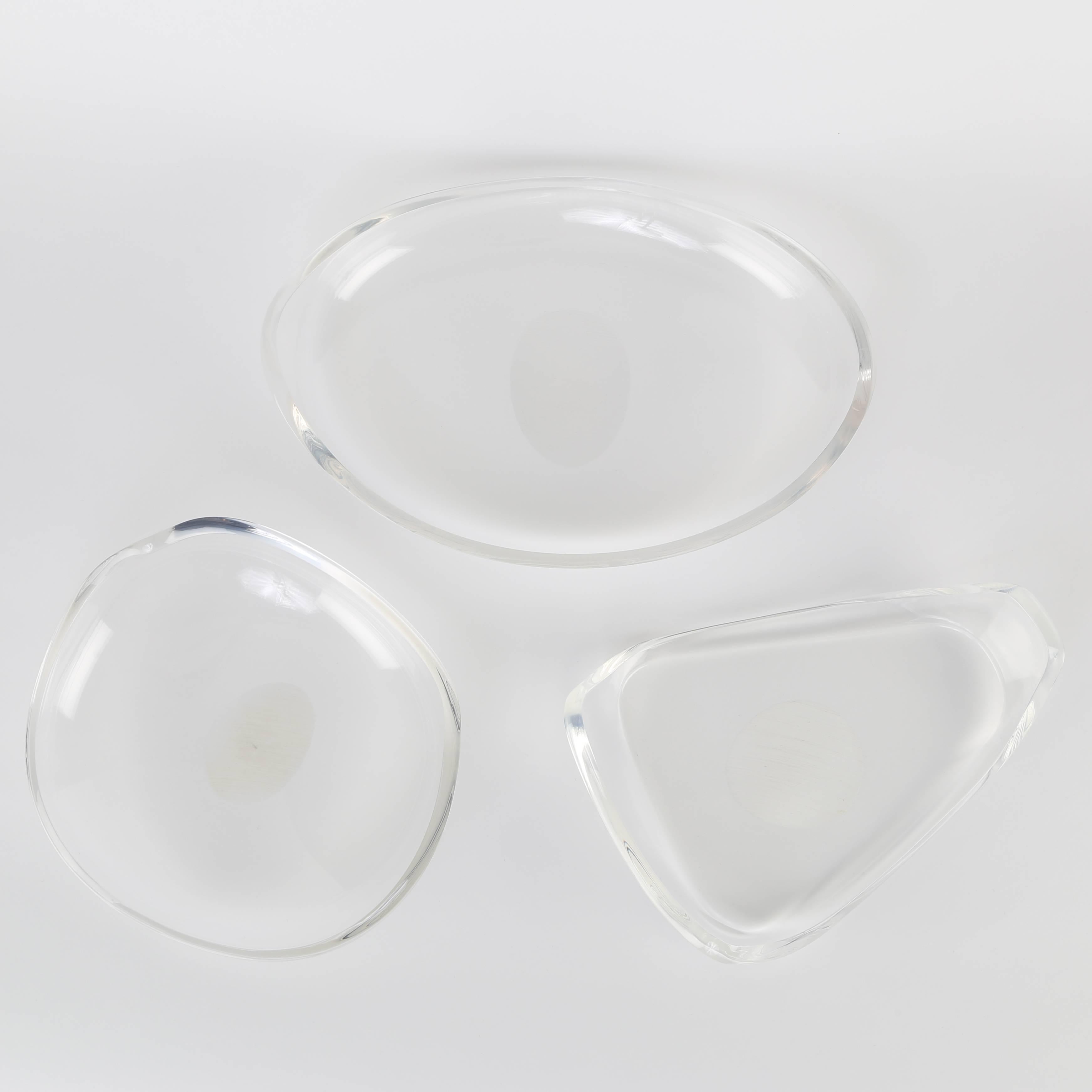 This set of three, free-form sculptural acrylic bowls makes a great tablescape, with light bouncing in all directions. From the Astrolite line by the Ritts Co. of Los Angeles, owned by Herbert and Shirley Ritts, parents of the deceased photographer