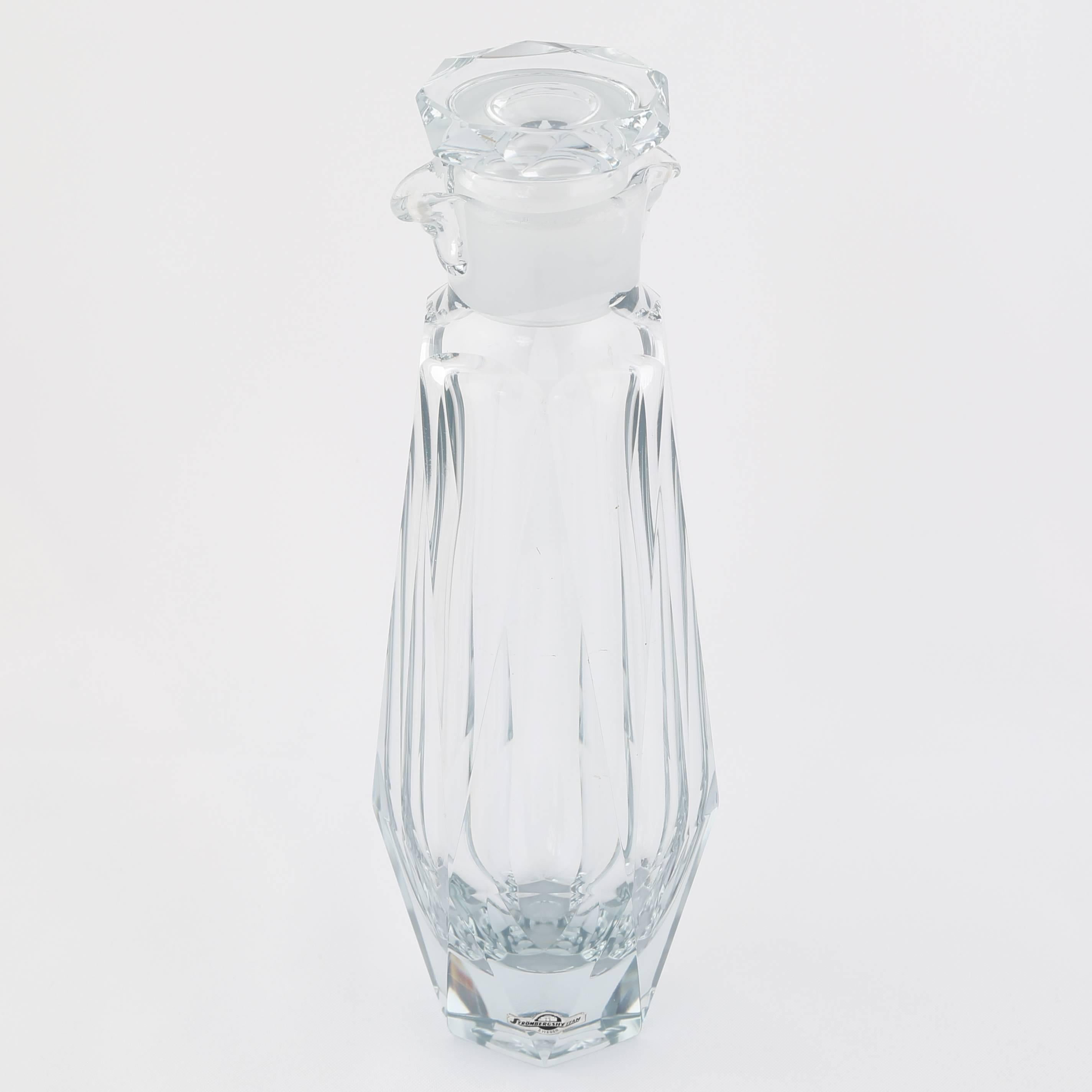Lovely cocktail shaker in faceted Strombergshyttan blue-silver glass, Sweden, circa 1950s. Etched 
