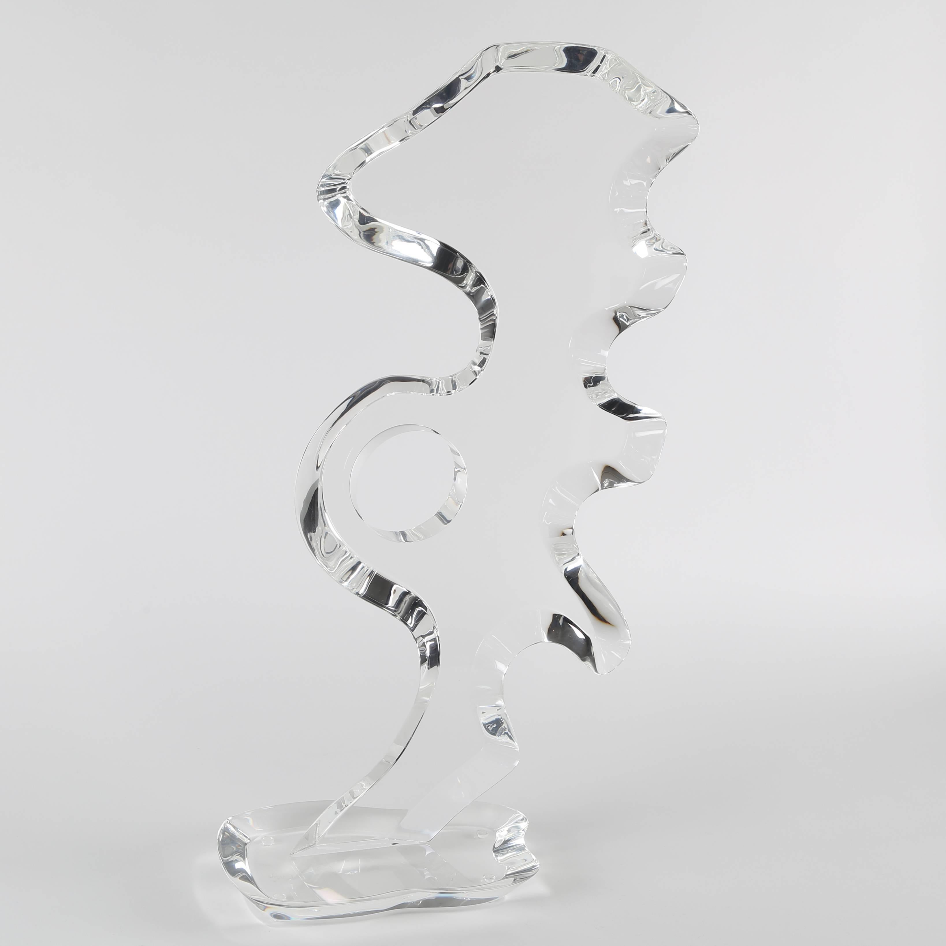Polished acrylic abstract figural sculpture on biomorphic base, by Cuban-born Hivo Van Teal of Miami, circa 1970s. Extensive beveling to the Lucite results in interesting light refractions from every angle. Etched 