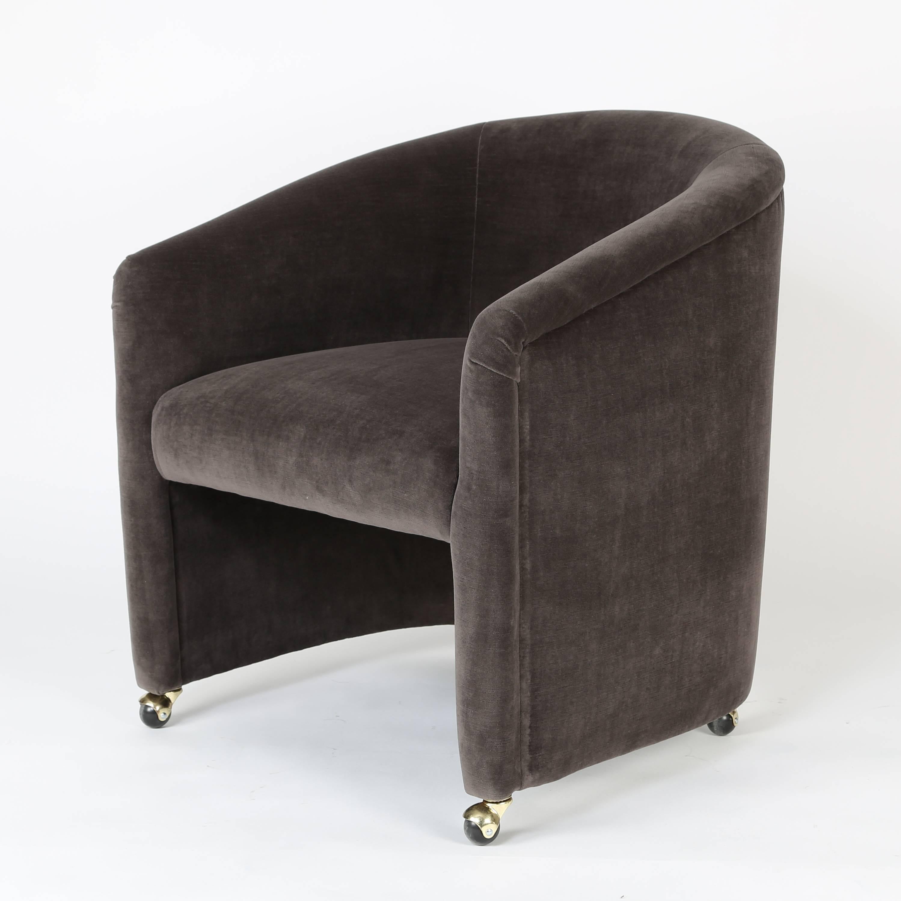 Vintage barrel-back tub chair on brass-finished casters, restored and reupholstered in a warm-grey antiqued cotton velvet. Substantial and comfortable enough to use in a living-room seating group.

See this chair in our Brooklyn showroom, 61