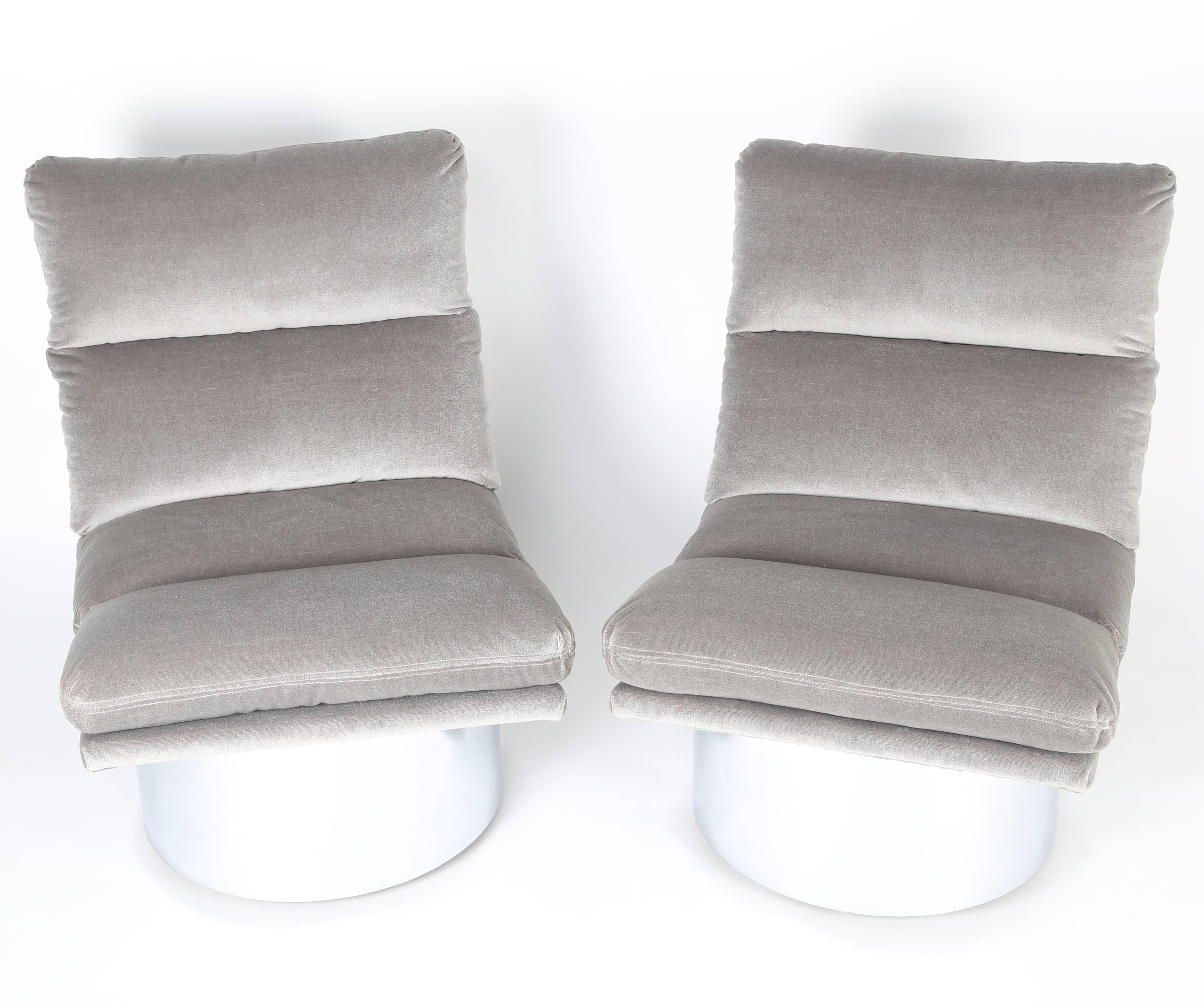 Comfortable and substantial pair of chic 1980s chrome-base swivel chairs with new warm-gray mohair upholstery. These chairs are in our Brooklyn showroom.