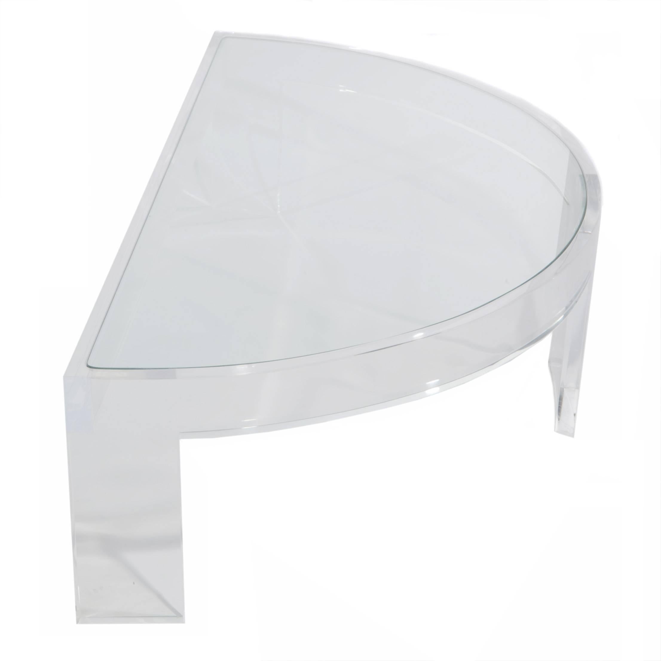 Thick, high-quality Lucite frame supports a semi-circular-shaped top with inset glass. 


