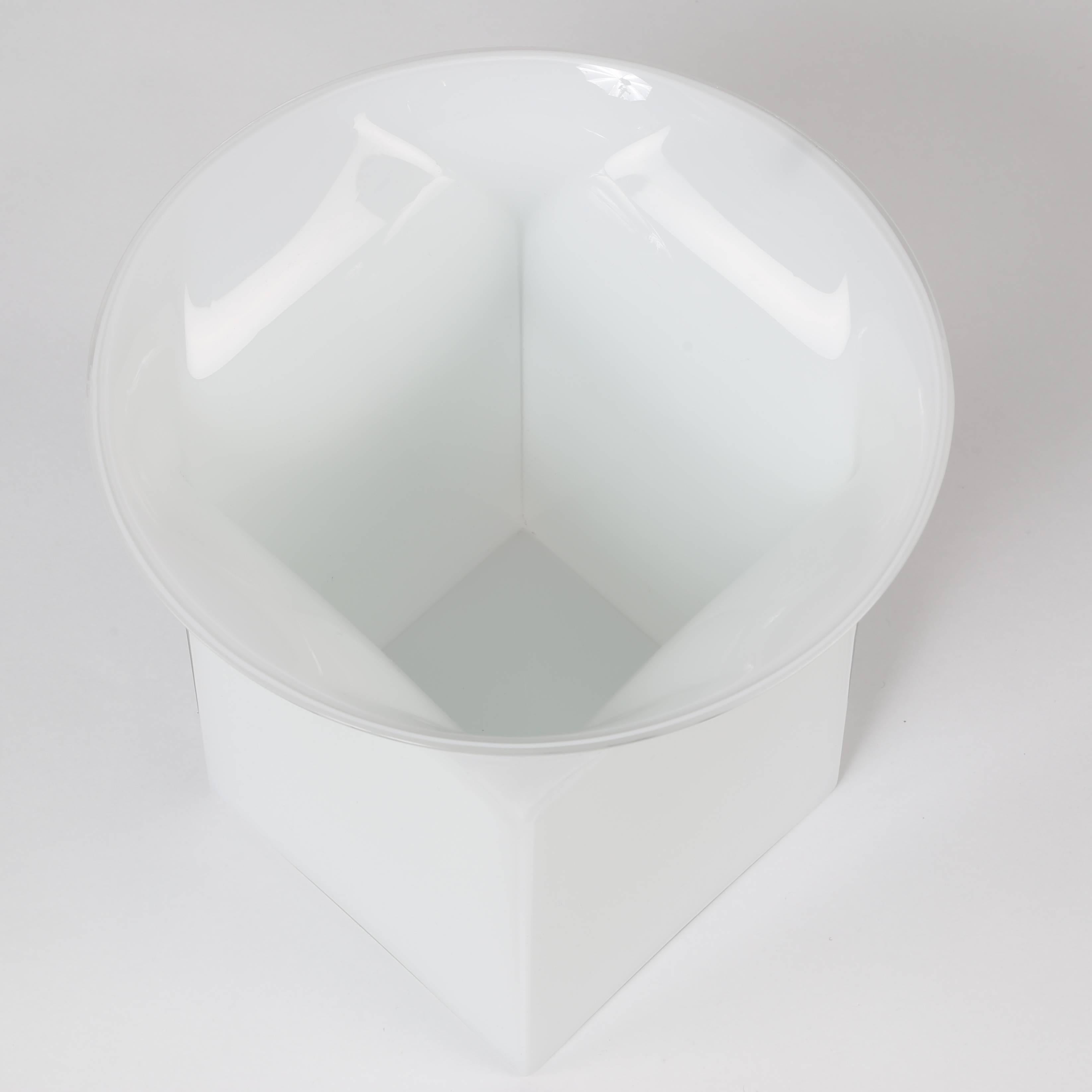 Beautiful square form, made of blown clear glass layered over white glass, flares to a round opening. 