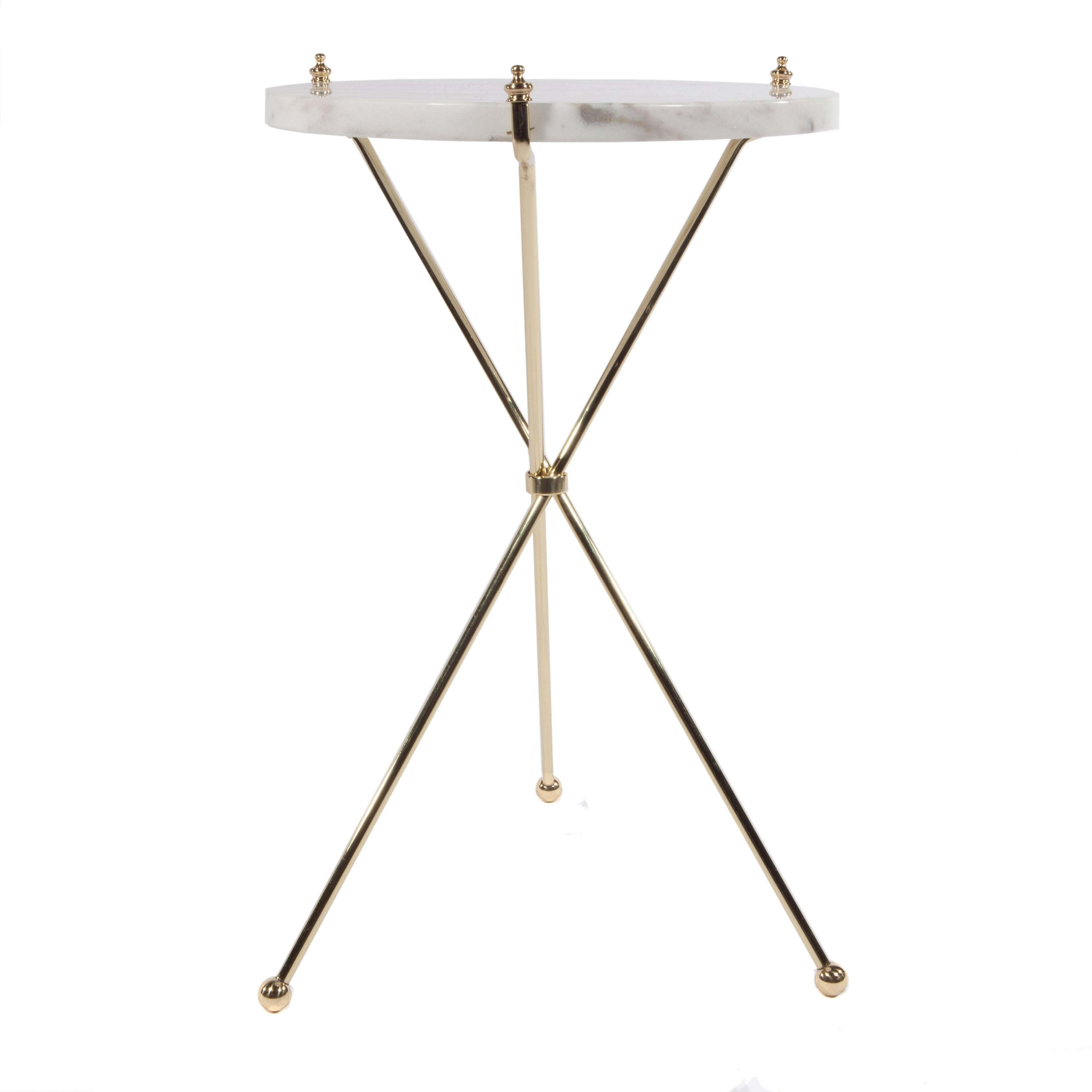 This chic three-leg occasional table will add just the right sparkle to any room. Brass is newly polished and lacquered; new piece of marble measures 13.75