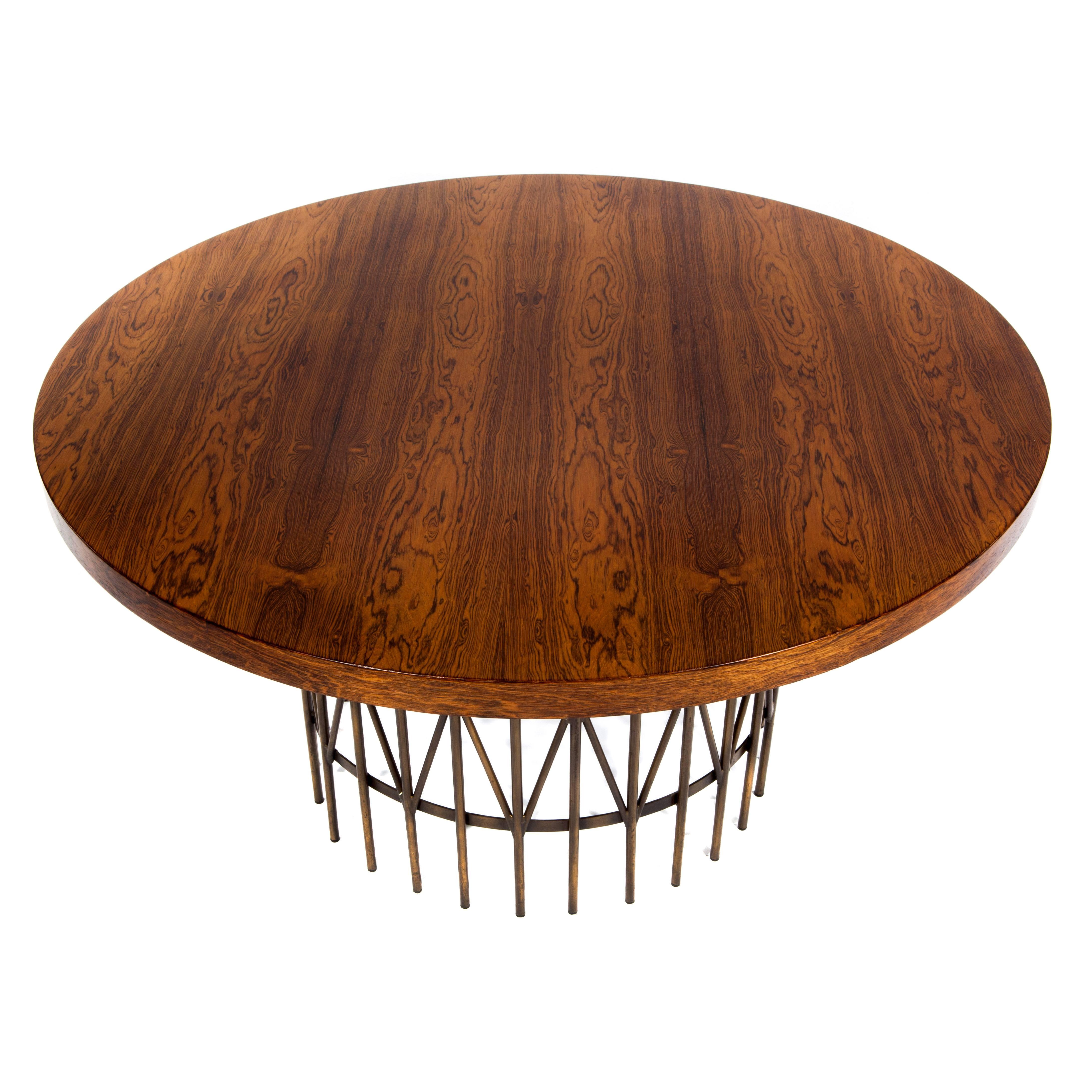 Striking hall table with a warm and richly grained rosewood top. The base consists of bronze-toned legs arranged in a geometrical motif. 

See this item in our Brooklyn showroom, 61 Greenpoint Ave., Suite 312, Brooklyn, 11 a.m. to 5 p.m. Tuesday