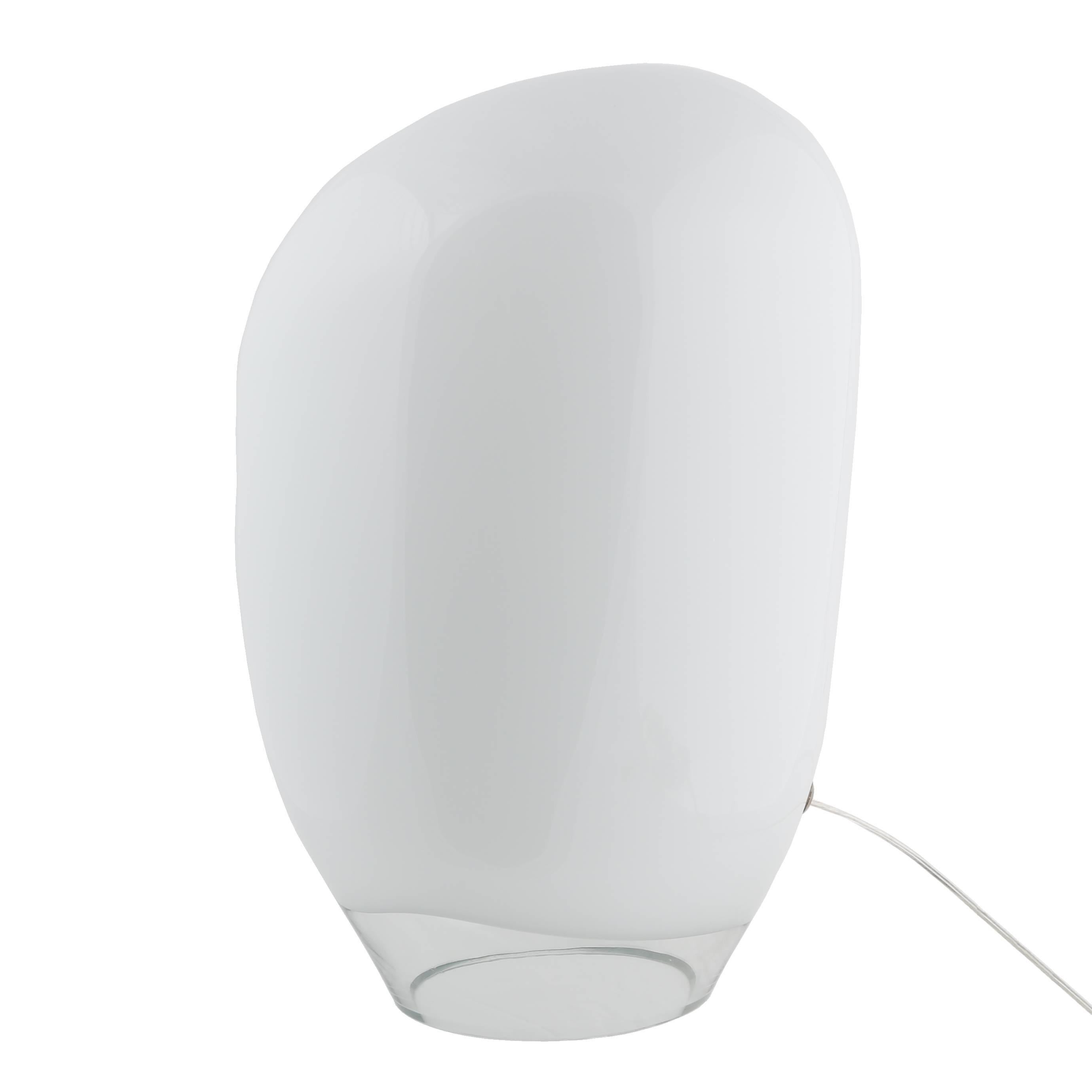 Sculptural Italian table lamp combining white and clear glass in a curvaceous biomorphic form. Takes a single standard-base bulb. Switch on cord. 