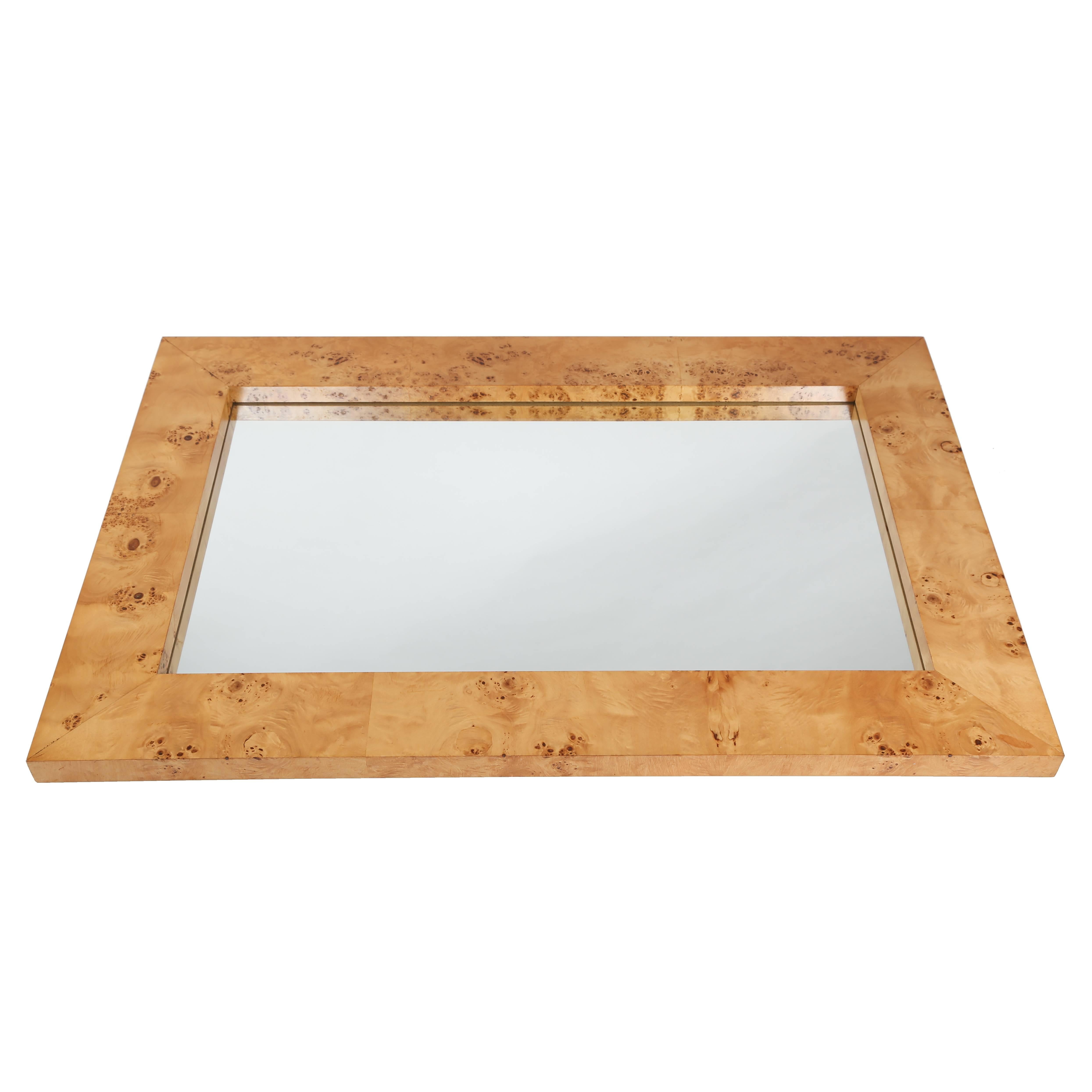 Large, well-made rectangular mirror with expressive olive burl frame. Hangs horizontally, as shown. 

See this item in the 1stdibs Gallery at the New York Design Center, 200 Lexington Ave., 10th floor, New York, 9:30 a.m. to 5:30 p.m. Monday through
