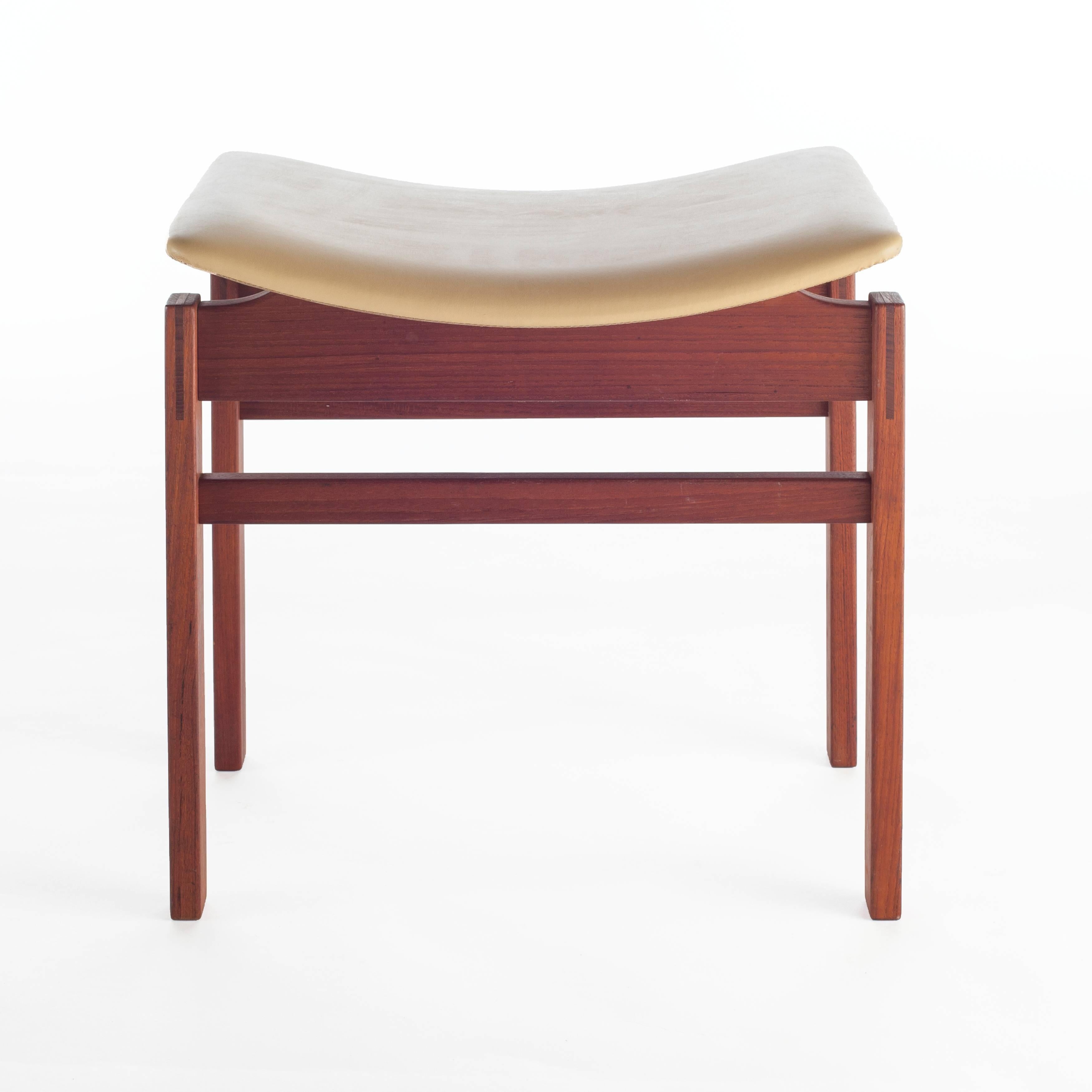 Lightweight yet sturdy, this versatile set of stools can be used in a variety of settings. The mustard-color leather on the curved seats contrast nicely with the rectangular lines and warm tones of the walnut frames. 

See these stools in our