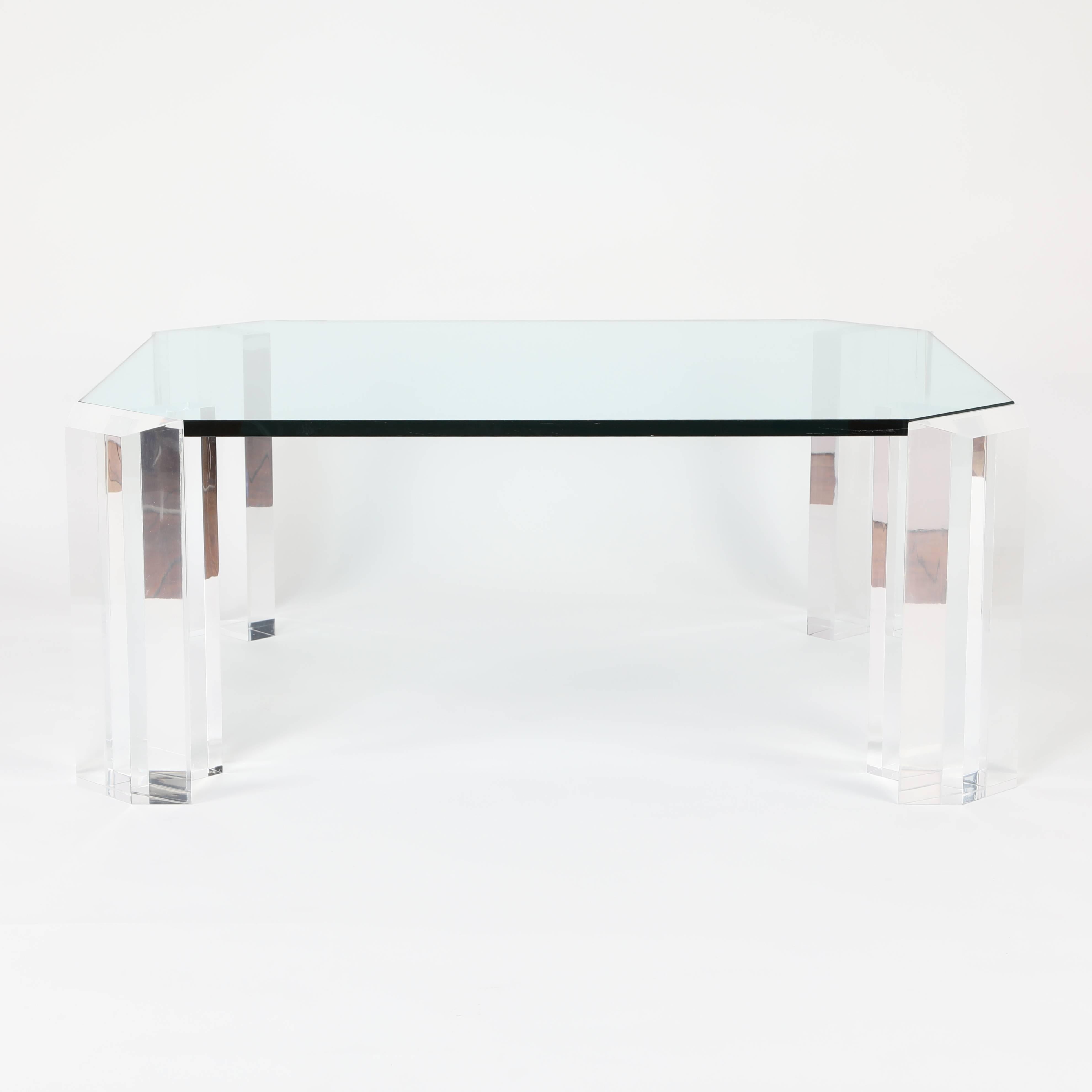 Rectangular 1970s Glass Cocktail Table with Clipped Corners and Lucite Supports In Good Condition For Sale In Brooklyn, NY
