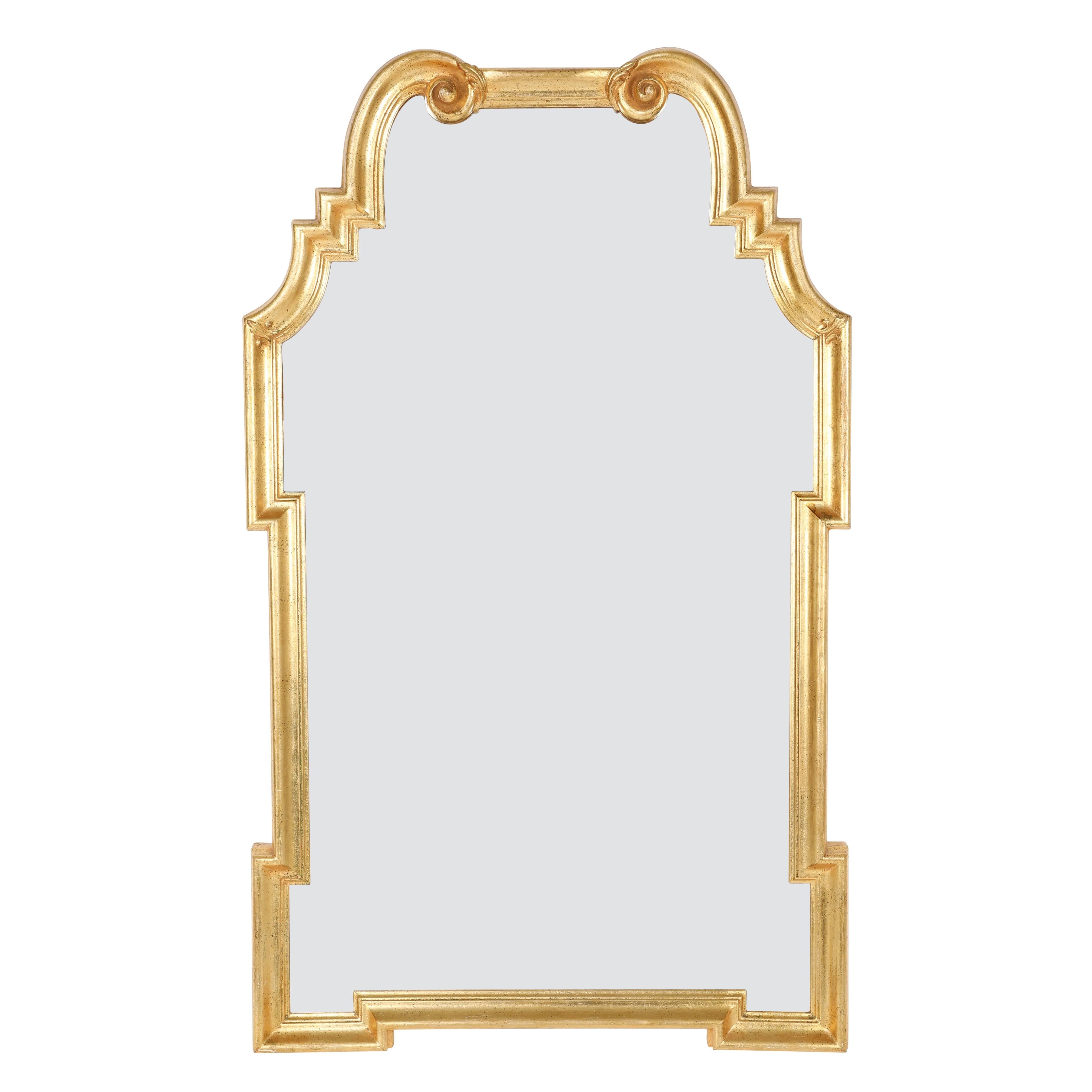 Fanciful 1960s Labarge wooden mirror with a gilt finish. Geometric sides lead to a scrolled top, giving this mirror transitional appeal. Unmarked. 

See this item in our Brooklyn showroom, 61 Greenpoint Ave., Suite 312, Brooklyn, 11 a.m. to 5 p.m.