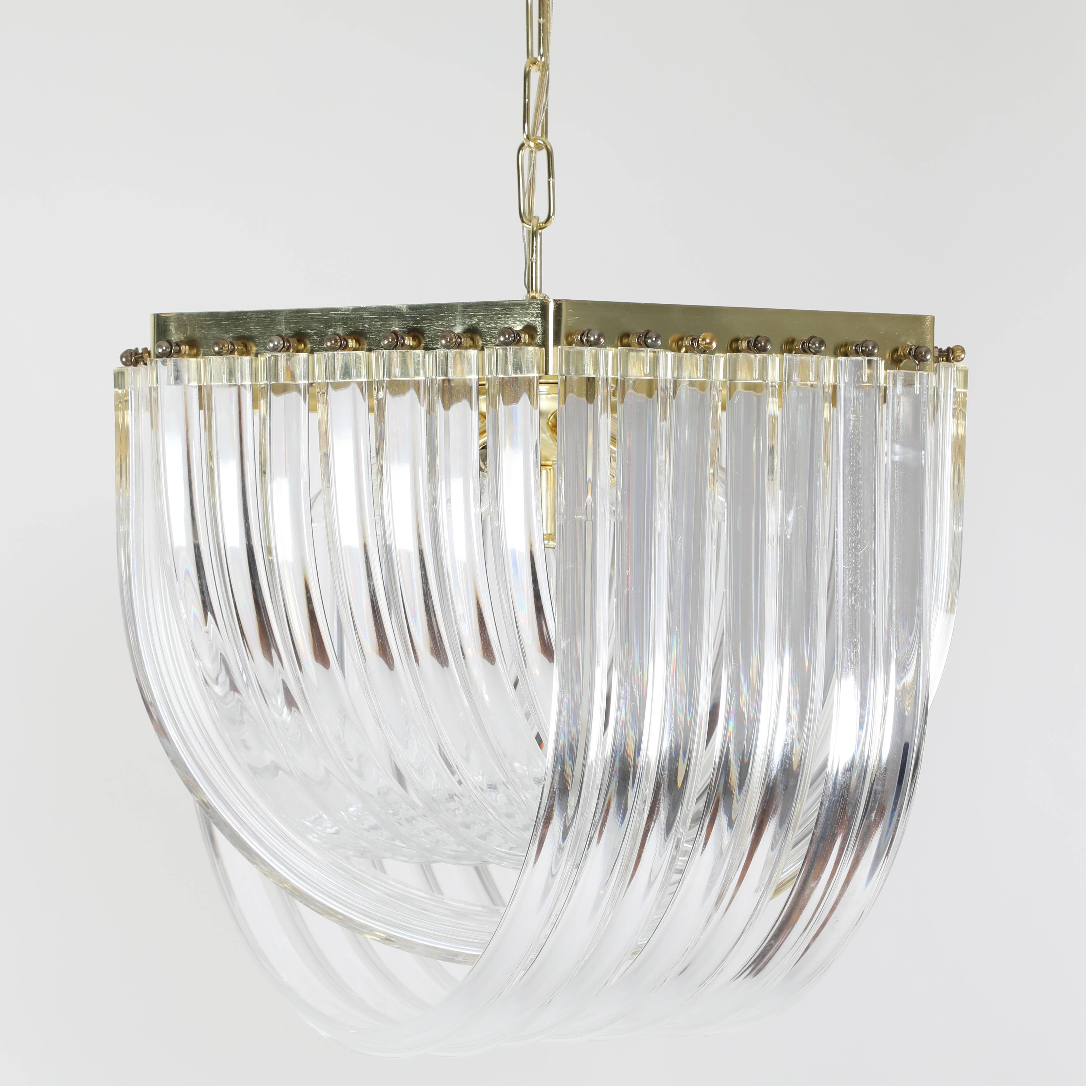 Polished 1970s Bent-Lucite Chandelier with Brass Frame
