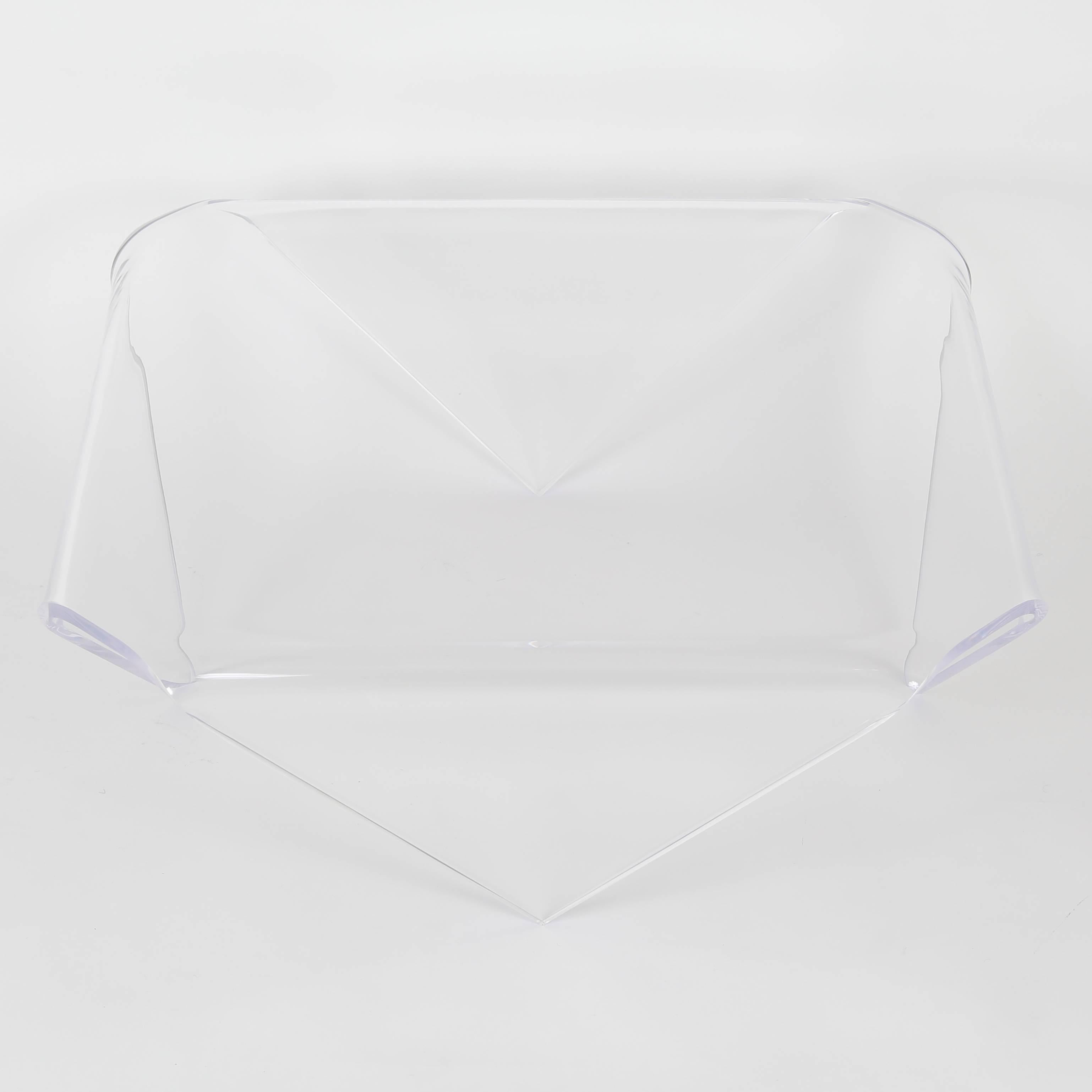 This substantial and elegant coffee table has been fabricated from a single sheet of 3/4-inch-thick clear acrylic, each corner precisely folded to form four inset triangular legs. This clear example is available for immediate purchase, or the table
