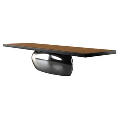 Tavolo da pranzo contemporaneo con base in alluminio lucido e piano in legno impiallacciato