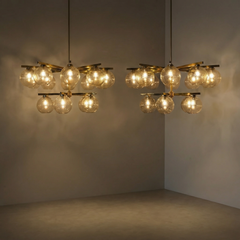 Pair of large Brass and Glass Globes Chandeliers by Hans-Agne Jacobson, Sweden