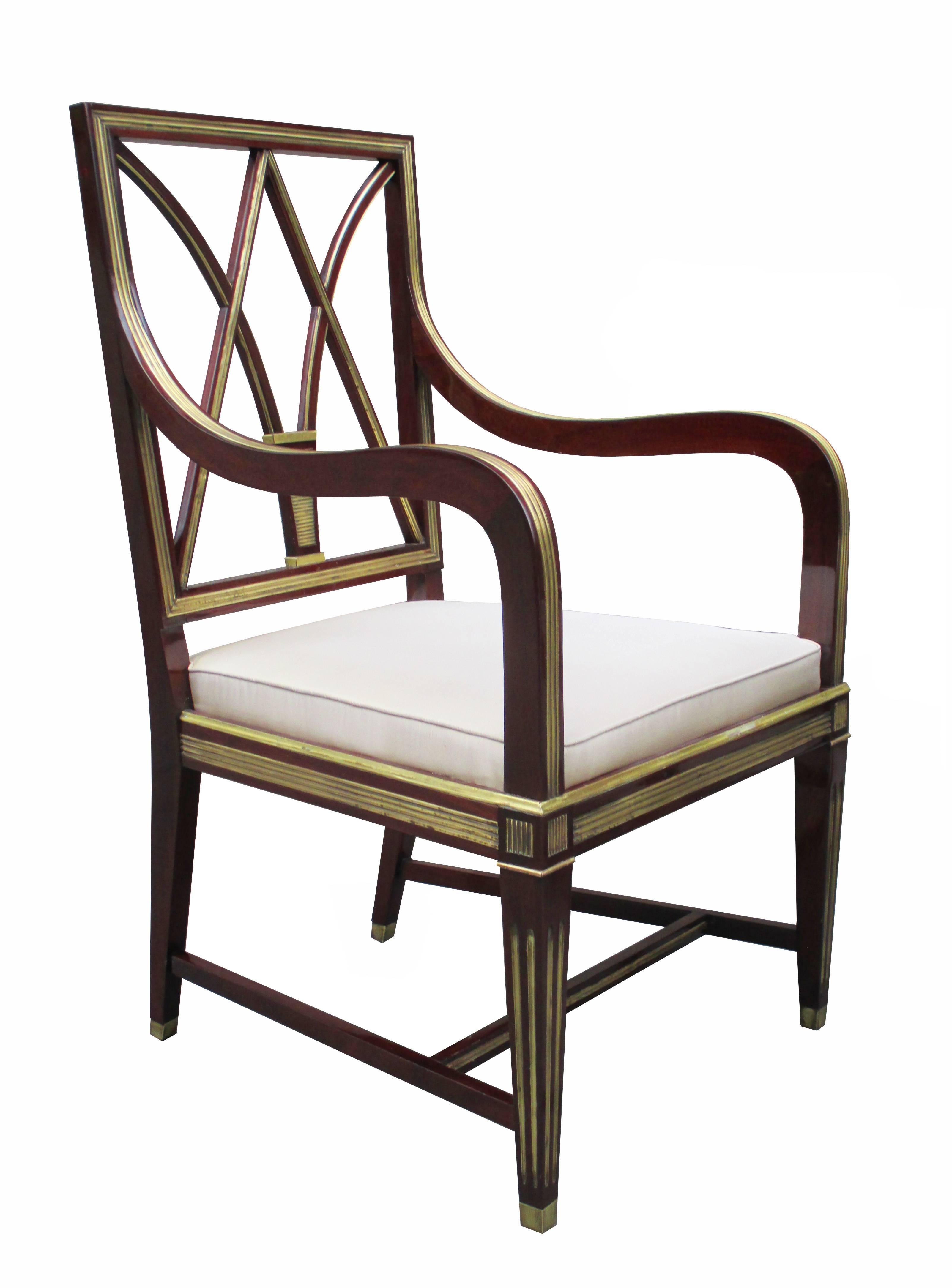 A fine pair of neoclassical armchairs.
Mahogany with patinated brass inlay, 
details and sabots.

Full Restoration by us.