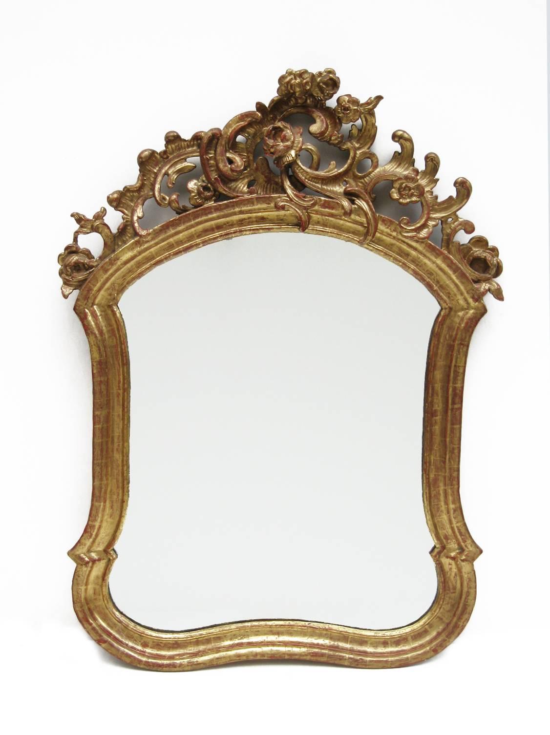 A fine pair of Baroque giltwood frames
with hand-carved scrolls and flowers on top.
  
